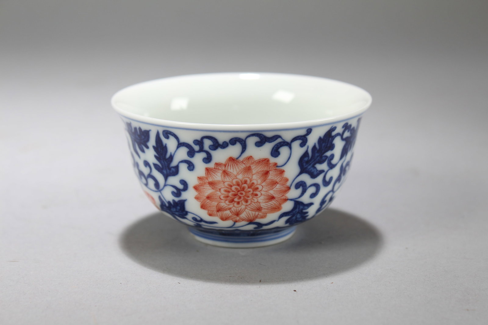 A Chinese Blue-and-white Porcelain Plant-fortune Cup: A Chinese Blue-and-white Porcelain Plant-fortune Cup. Height: 1.75 (inch). Opening Diameter: 3.25 (inch)
