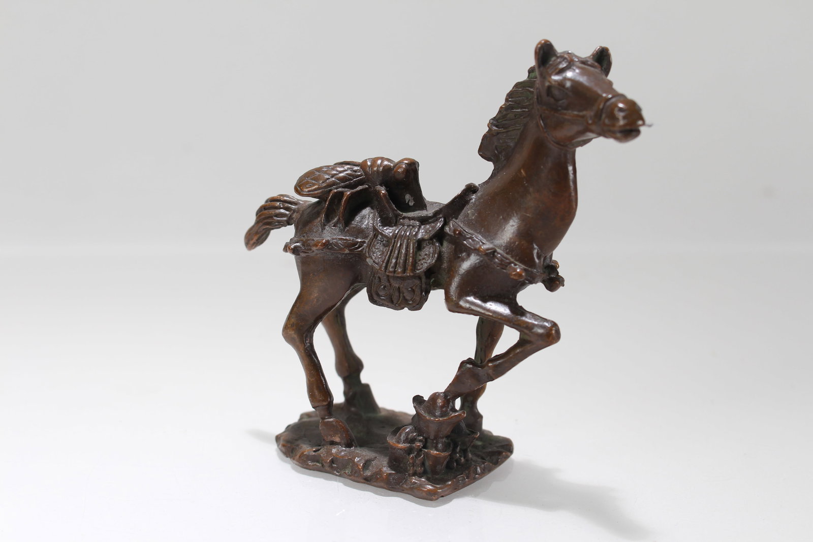 A Chinese Fortune Horse Statue: A Chinese Fortune Horse Statue. Height: 3.75 (inch). Length: 4 (inch)