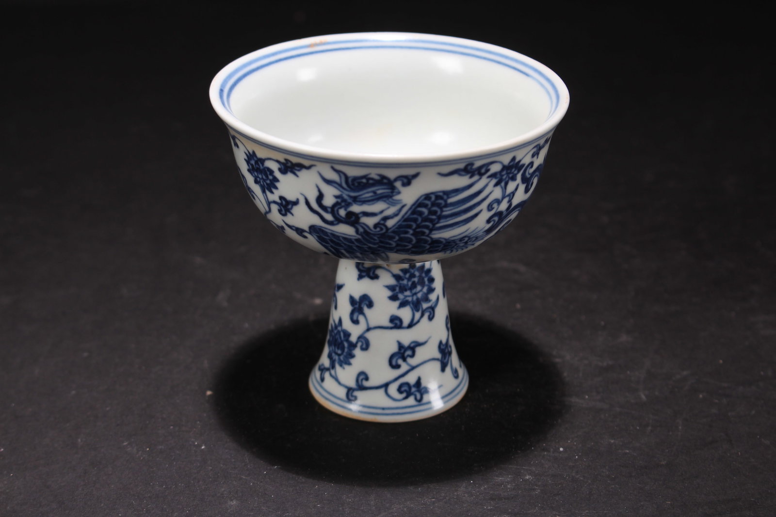 A Chinese Blue and White Dragon-decorating Porcelain Cup: A Chinese Blue and White Dragon-decorating Porcelain Cup. Height: 3.5 (inch). Opening Diameter: 3.5 (inch).