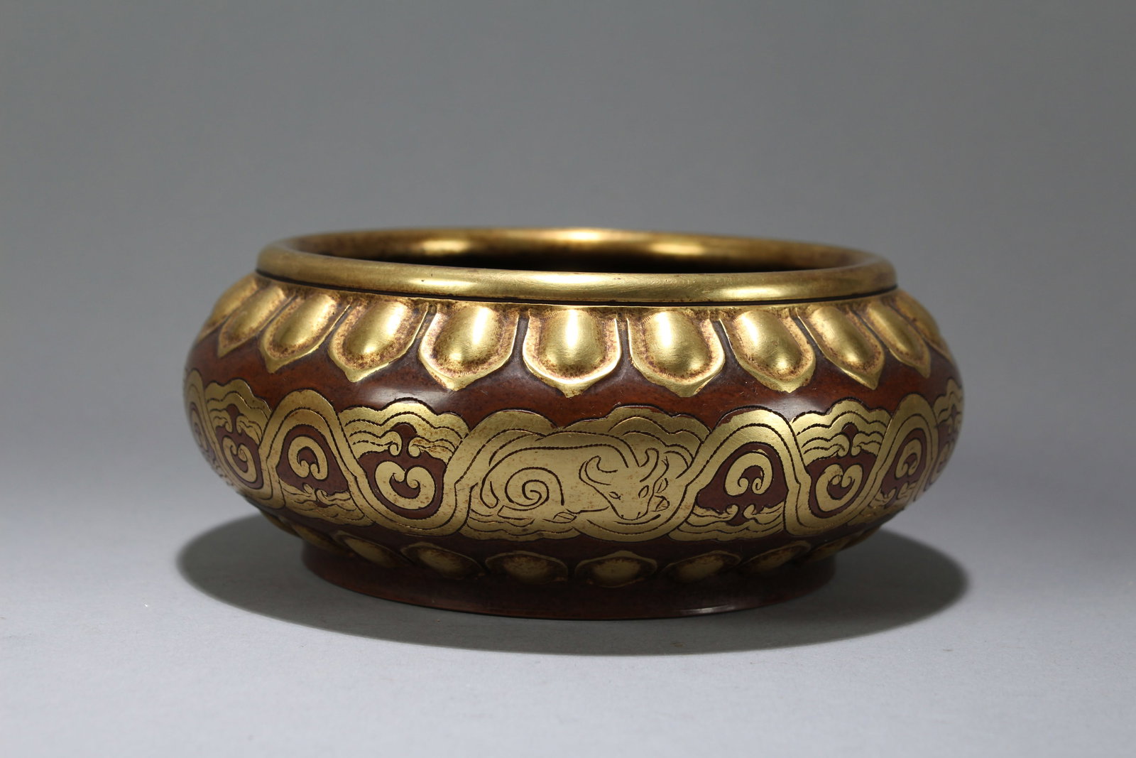 A Chinese Vividly-detailed Bat-framing Fortune Gilt Censer: A Chinese Vividly-detailed Bat-framing Fortune Gilt Censer. Height: 2.5 (inch). Opening Diameter: 6 (inch).