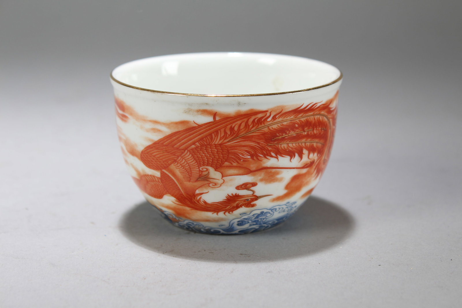 A Chinese Porcelain Phoenix-fortune Cup: A Chinese Porcelain Phoenix-fortune Cup. Height: 2.25 (inch). Opening Diameter: 3.5 (inch)