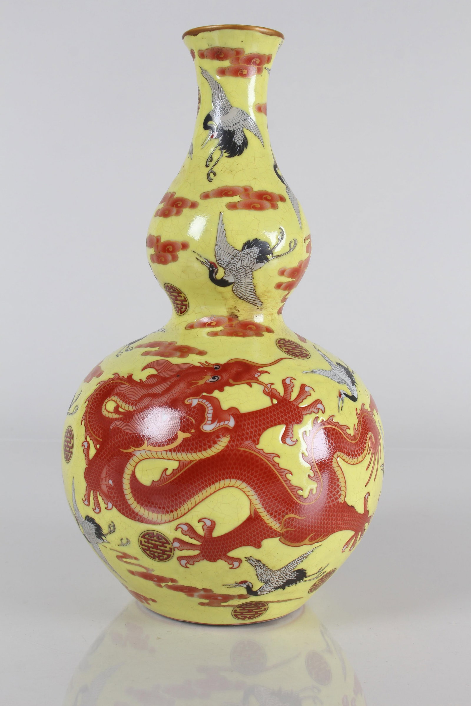 A Chinese Dragon-decorating Yellow-coding Porcelain Vase: A Chinese Dragon-decorating Yellow-coding Porcelain Vase . Height: 9.75 (inch).