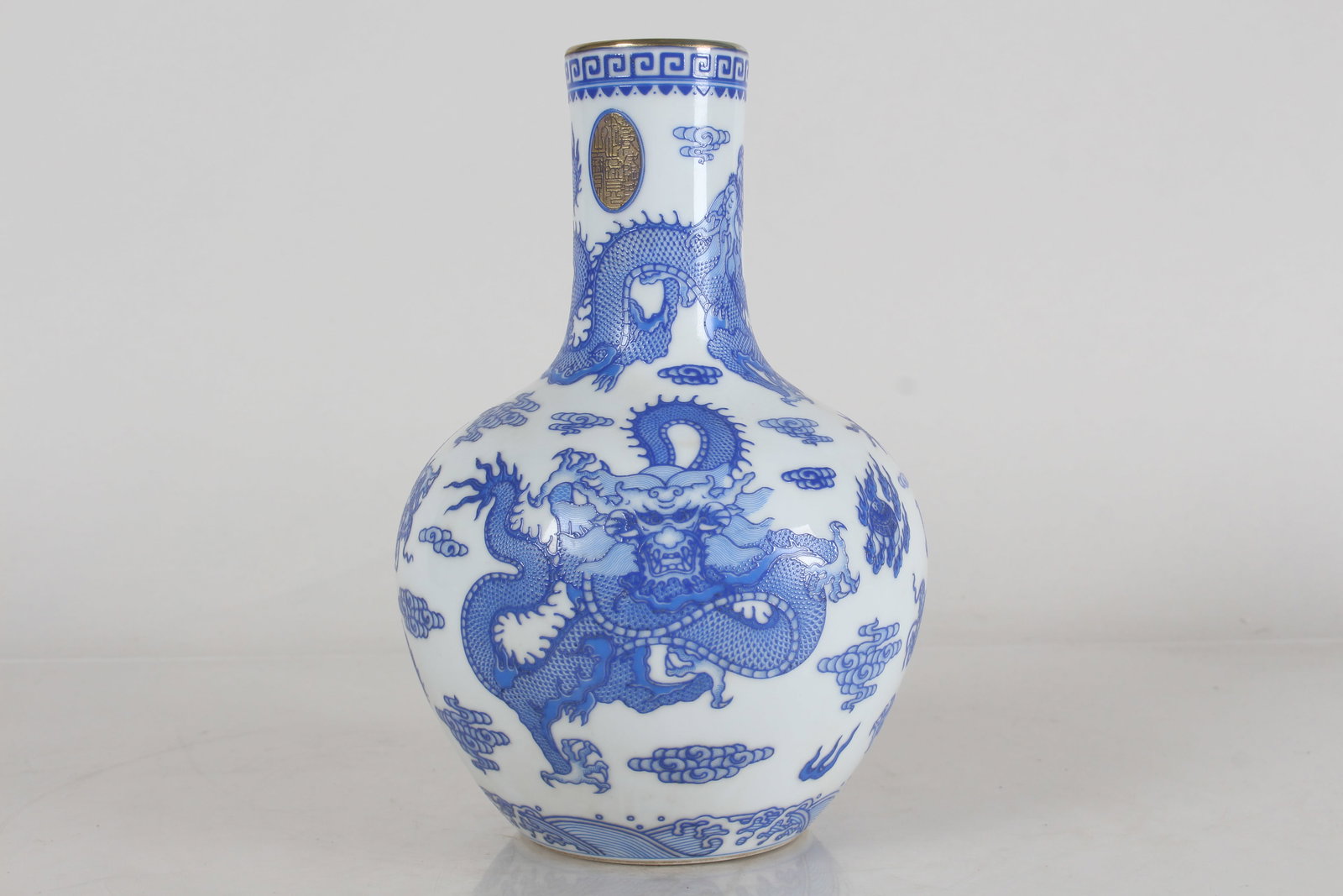 A Chinese Dragon-decorating Detailed Porcelain Fortune Vase: A Chinese Dragon-decorating Detailed Porcelain Fortune Vase . Height: 7.75 (inch).
