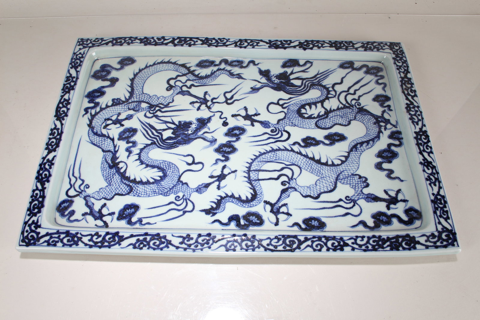 A Chinese Blue and White Massive Story-telling Porcelain Plate: A Chinese Blue and White Massive Story-telling Porcelain Plate. Height: 6.75 (inch). Length: 20(inch). Width: 13.75 (inch).