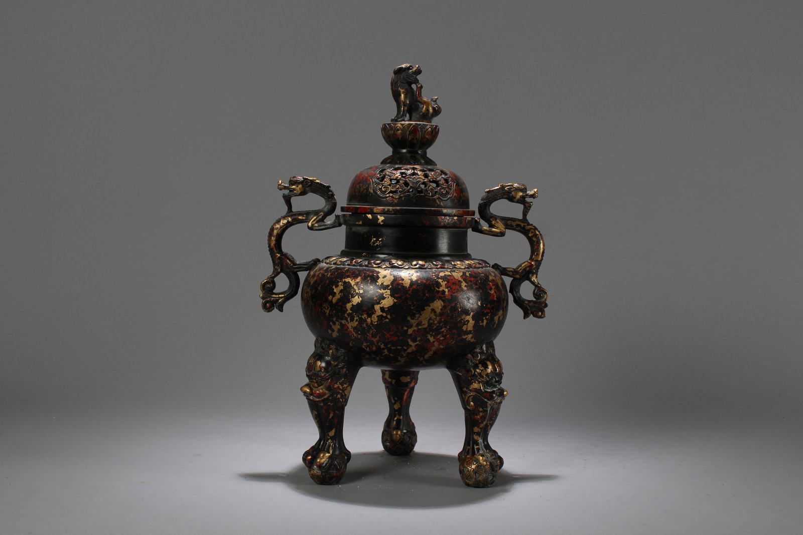 A Chinese Duo-handled Dragon-decorating Tri-podded Fortune Censer (1 of 8)