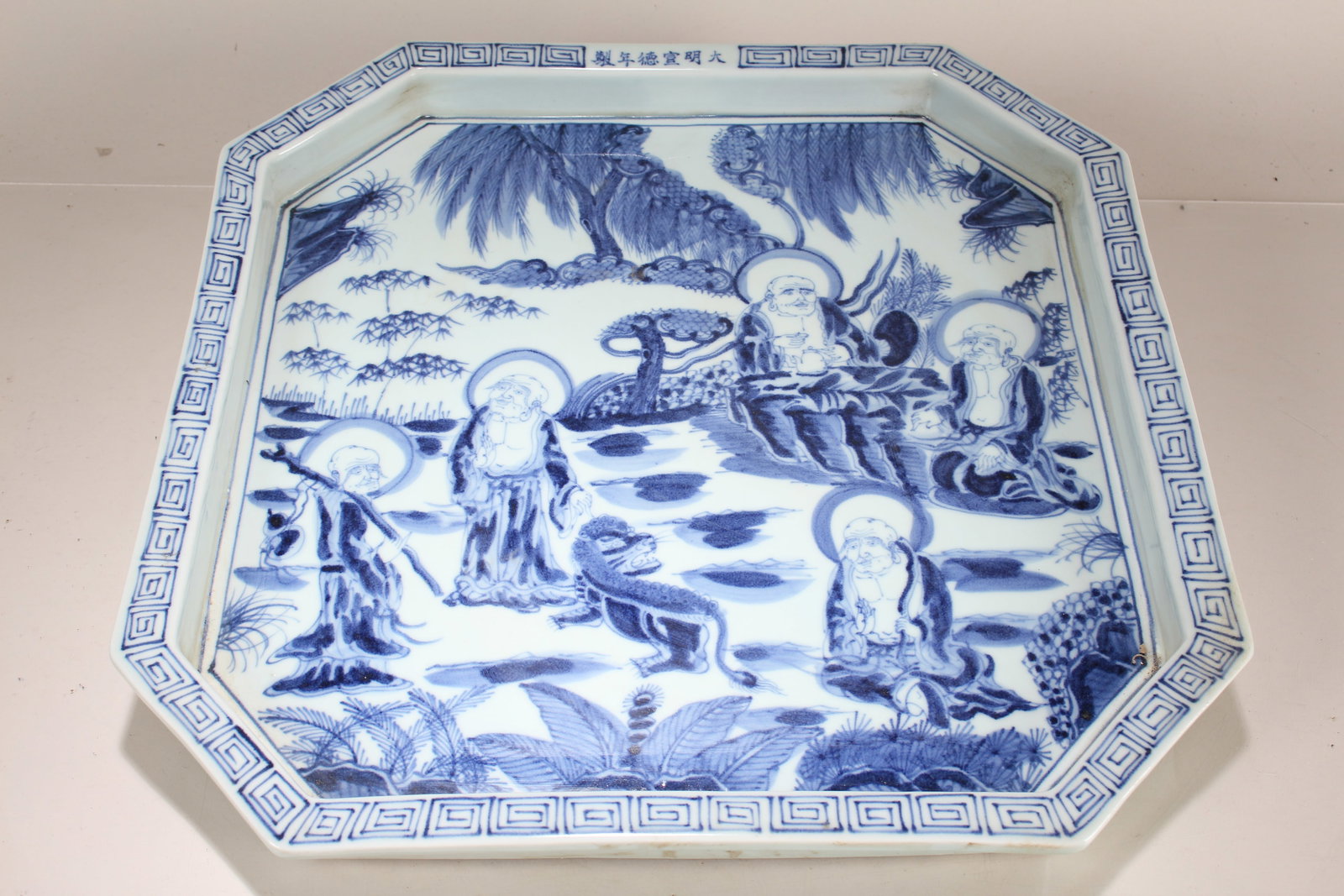 A Chinese Blue and White Square-based Massive Porcelain Fortune Plate: A Chinese Blue and White Square-based Massive Porcelain Fortune Plate. Height: 1.5 (inch). Length: 16 (inch). Width: 16 (inch).