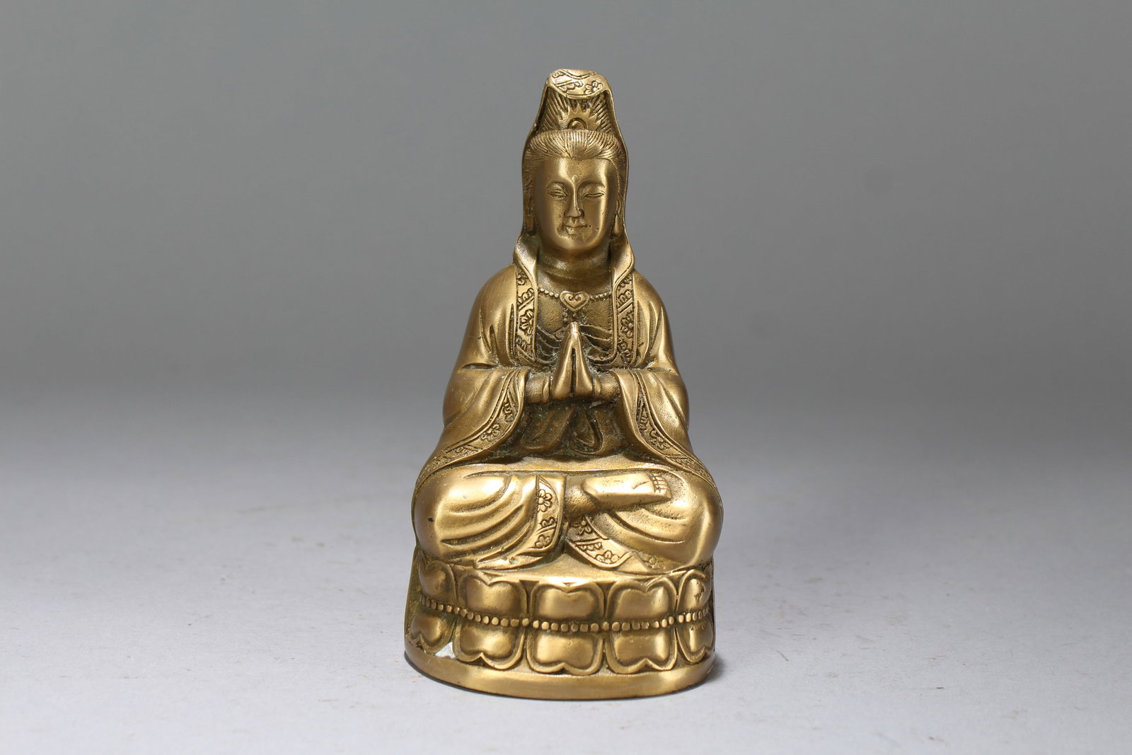 A Chinese Religious Gilt Fortune Buddha Statue: A Chinese Religious Gilt Fortune Buddha Statue. Height: 4.75 (inch). Length: 2.5 (inch). Width: 2 (inch).