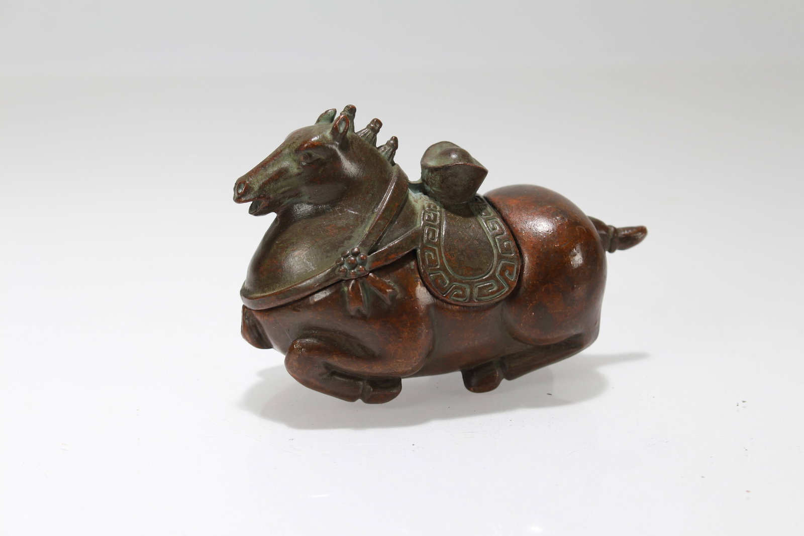 A Chinese Fortune Horse Statue: A Chinese Fortune Horse Statue. Height: 2 (inch). Length: 3 (inch).