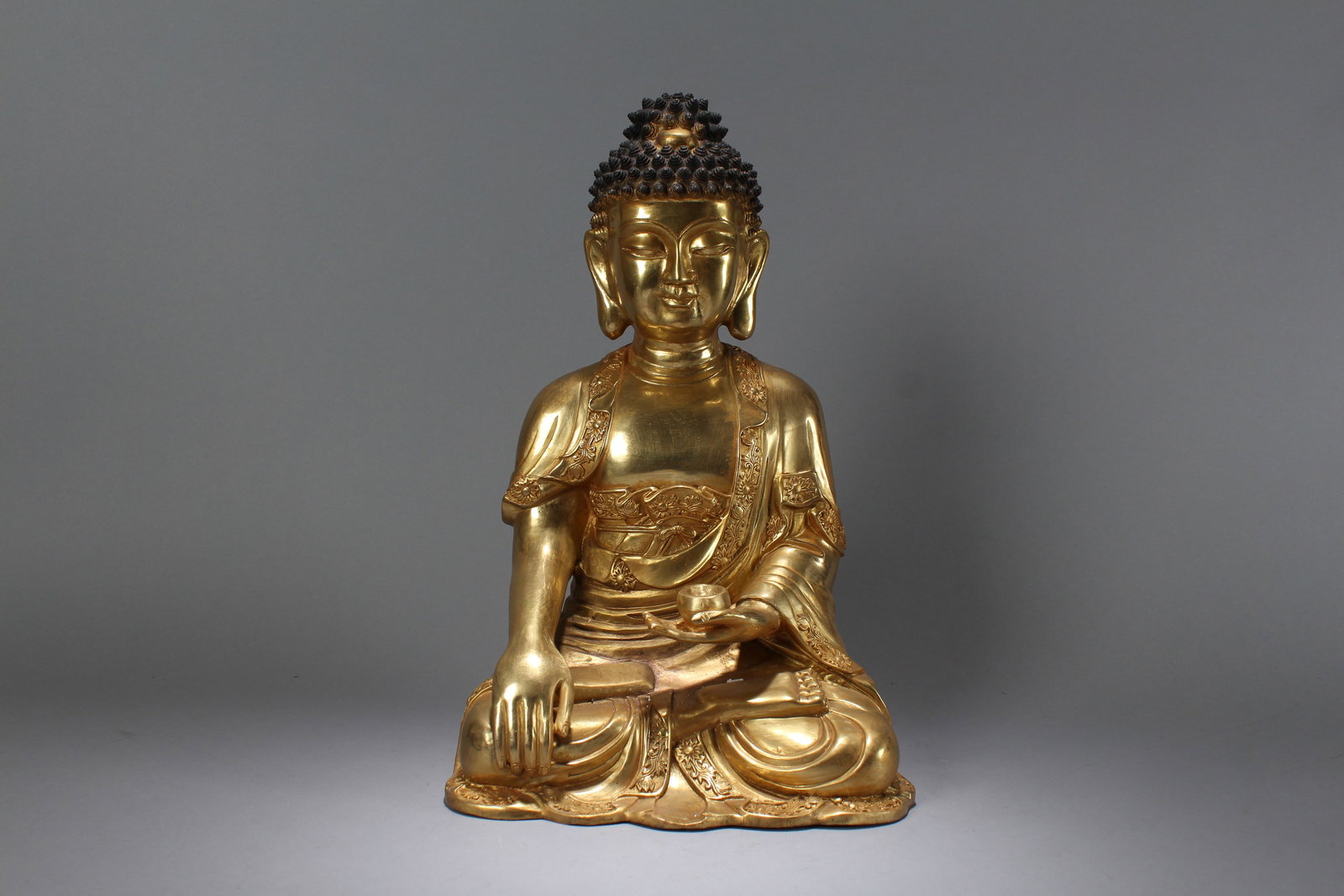 A Chinese Religious Gilt Pondering-pose Fortune Buddha Statue: A Chinese Religious Gilt Pondering-pose Fortune Buddha Statue. Height: 16.5 (inch). Width: 10.5 (inch). Length: 8 (inch)
