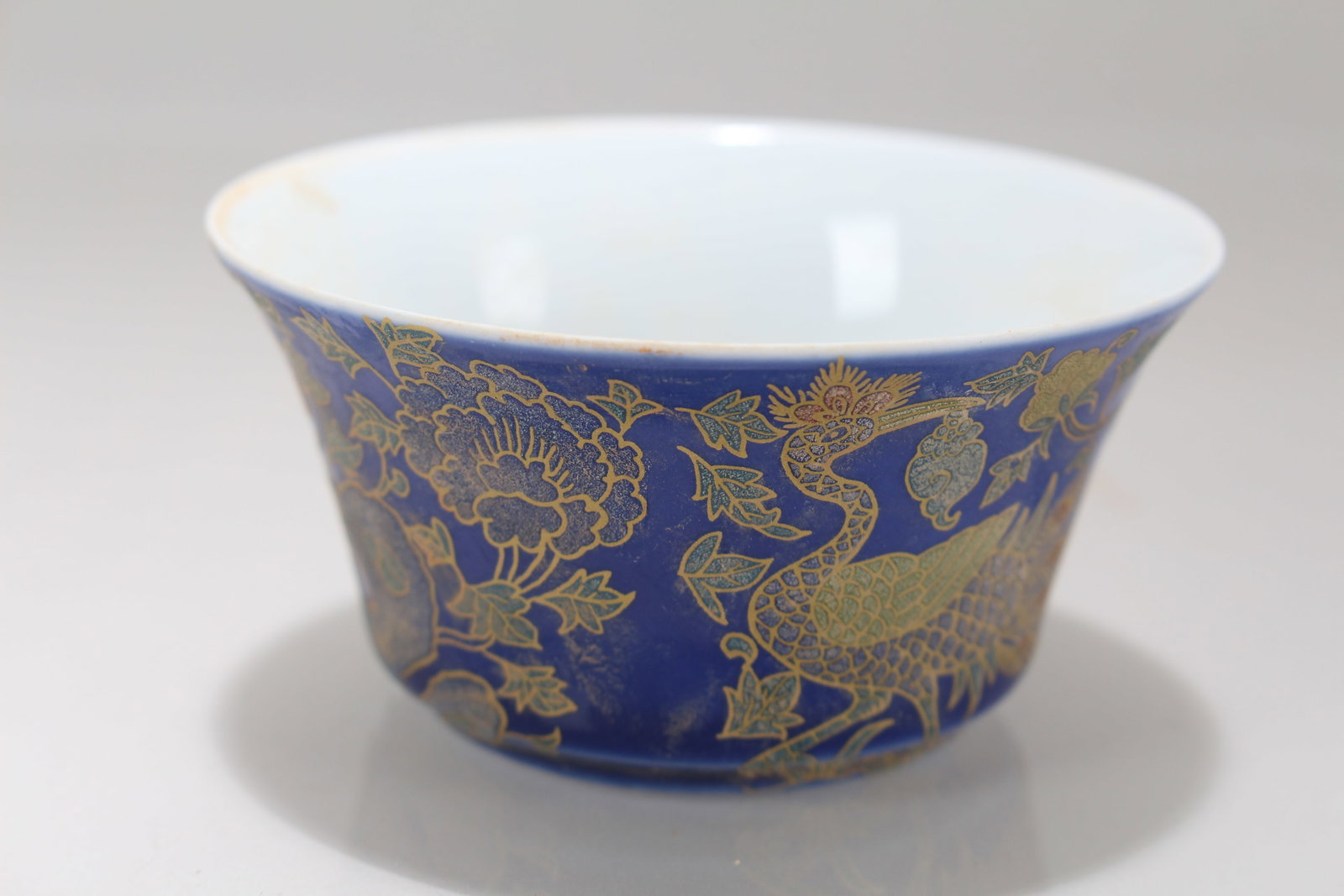 A Chinese Ancient-framing Blue-coding Porcelain Fortune Cup: A Chinese Ancient-framing Blue-coding Porcelain Fortune Cup. Height: 1.75 (inch). Opening Diameter: 3.5 (inch).