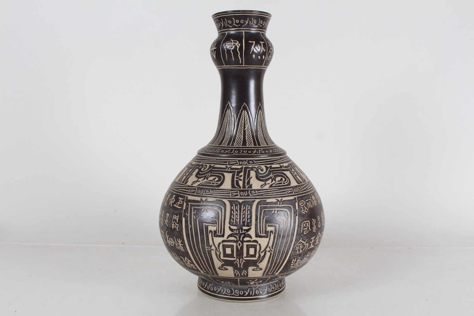 A Chinese Ancient-framing Black-coding Porcelain Fortune Vase: A Chinese Ancient-framing Black-coding Porcelain Fortune Vase . Height: 14 (inch).