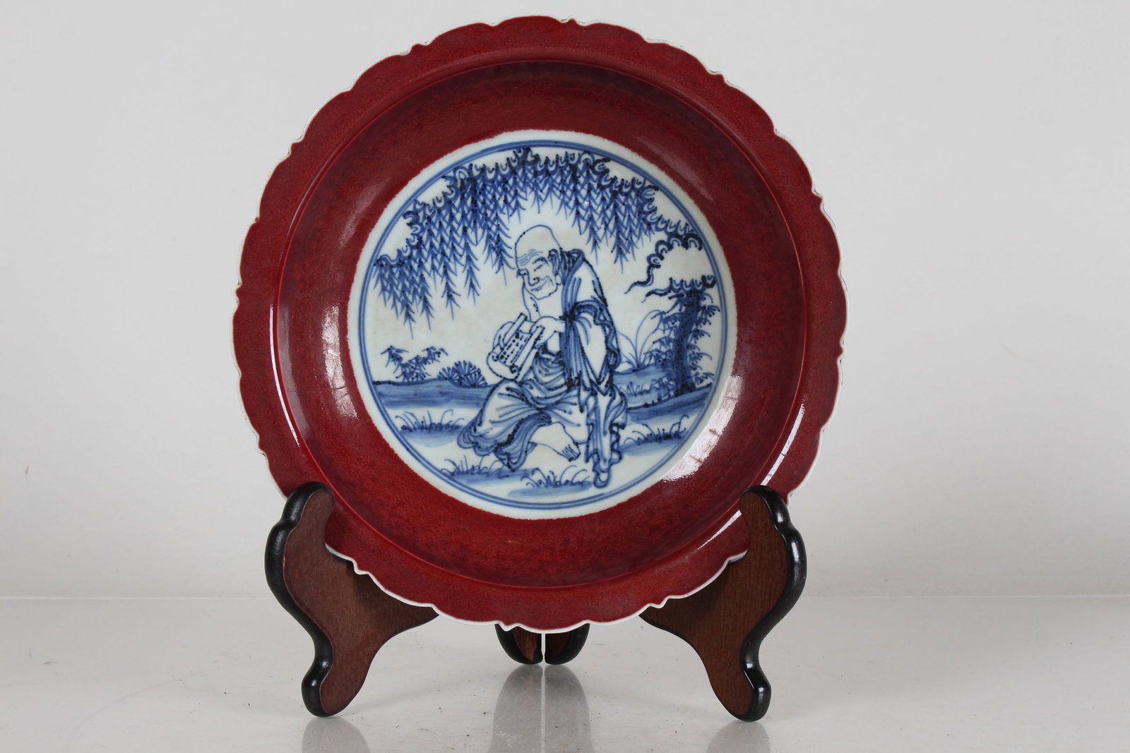 A Chinese Blue and White Red-framing Elder-portrait Porcelain Fortune Plate: A Chinese Blue and White Red-framing Elder-portrait Porcelain Fortune Plate. Height: 2 (inch). Opening Diameter: 8.75 (inch).