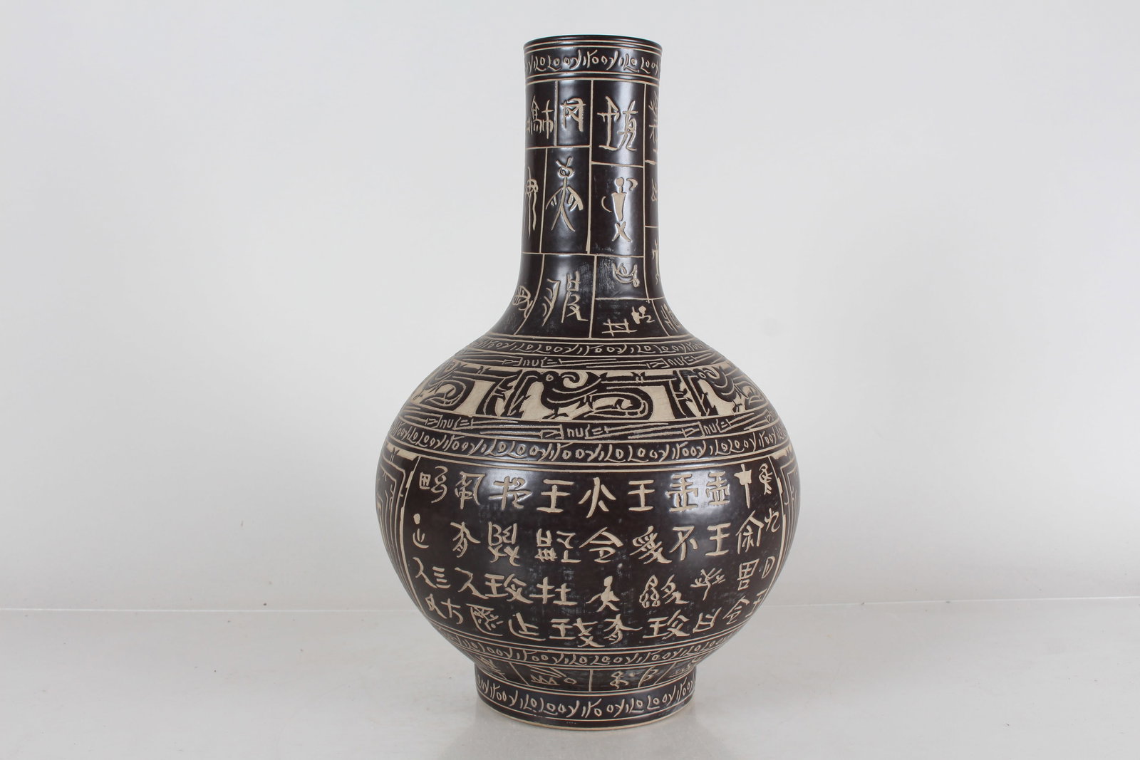 A Chinese Ancient-framing Black-coding Porcelain Fortune Vase: A Chinese Ancient-framing Black-coding Porcelain Fortune Vase . Height: 14.5 (inch).