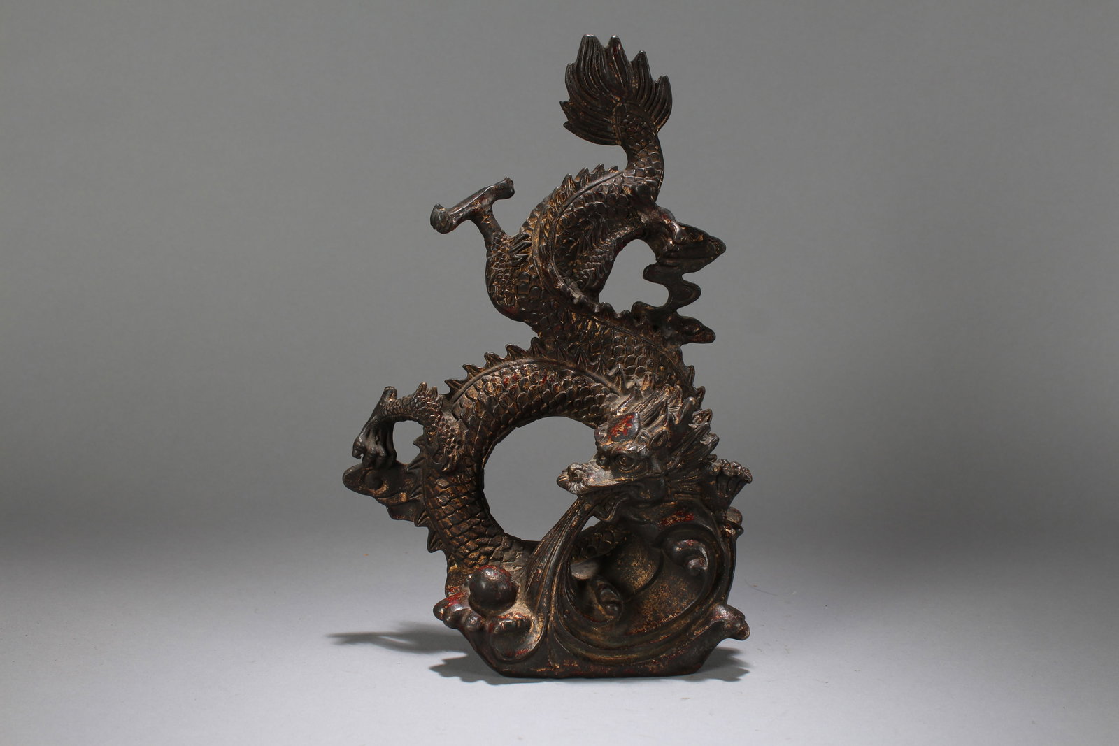 A Chinese Vividly-detailed Dragon Fortune Statue: A Chinese Vividly-detailed Dragon Fortune Statue. Height: 11.5 (inch). Length: 8.5 (inch). Width: 3.5 (inch).