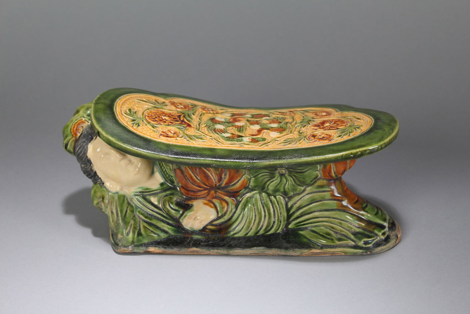 A Chinese Religious Porcelain Fortune Pillow Stand: A Chinese Religious Porcelain Fortune Pillow Stand. Height: 4.25 (inch). Length: 5 (inch)