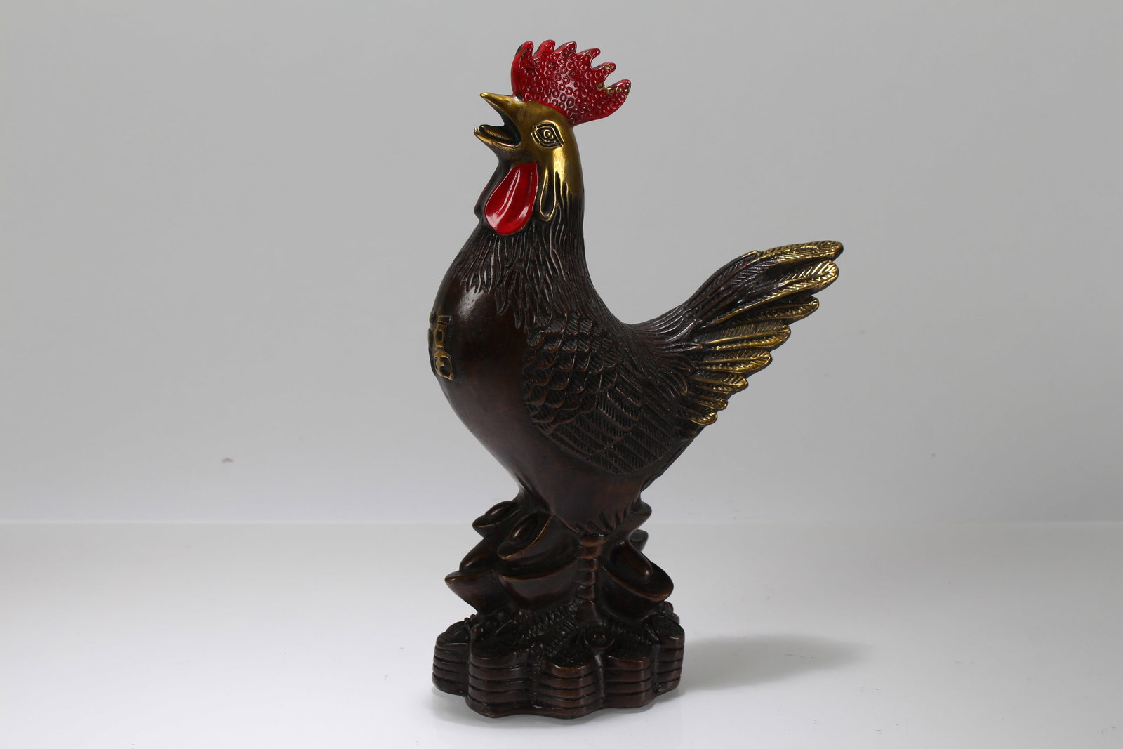 A Chinese Rooster Fortune Statue Display: A Chinese Rooster Fortune Statue Display. Height: 9 (inch). Length: 6 (inch).