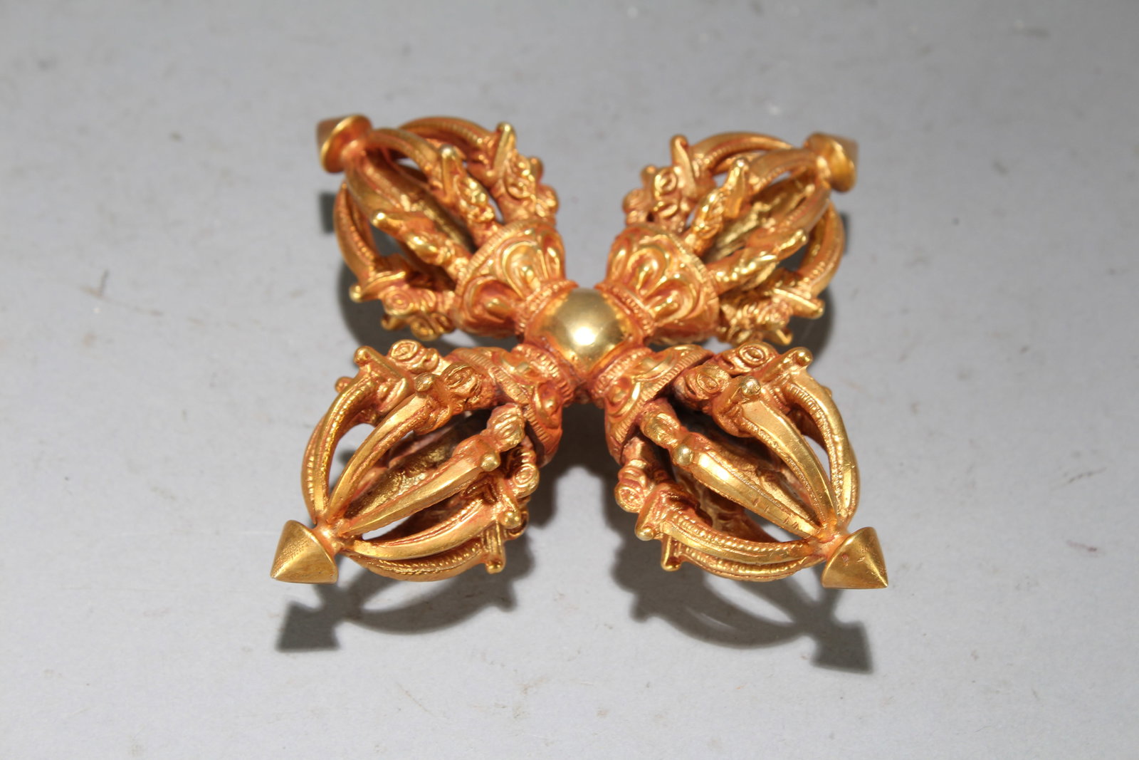 A Chinese Vividly-detailed Gilt Fortune Figure: A Chinese Vividly-detailed Gilt Fortune Figure. Height : 1.5 (inch). Width : 5 (inch). Length : 5 (inch).