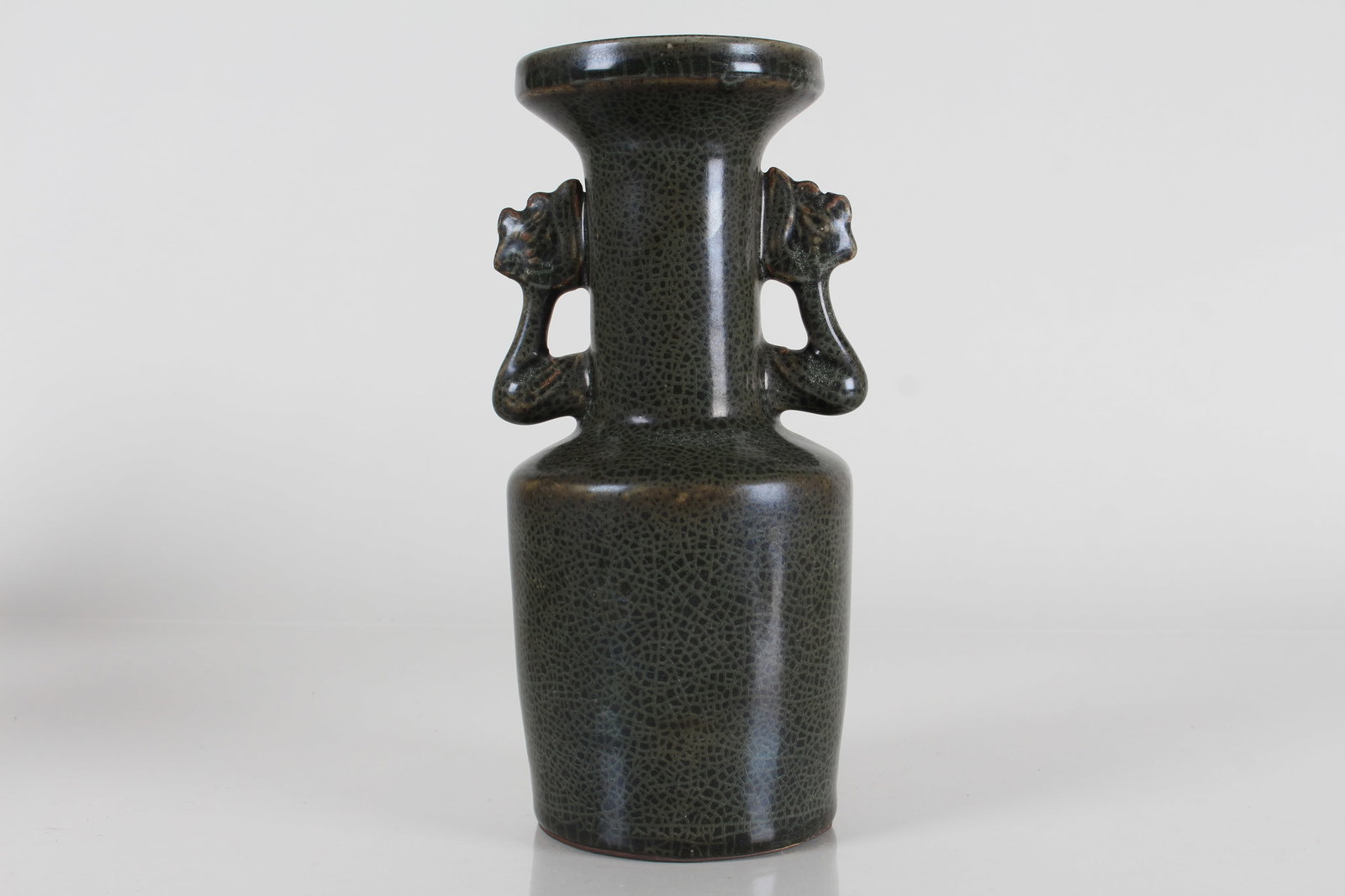 A Chinese Duo-handled Black-coding Porcelain Fortune Vase: A Chinese Duo-handled Black-coding Porcelain Fortune Vase . Height: 7.75 (inch).