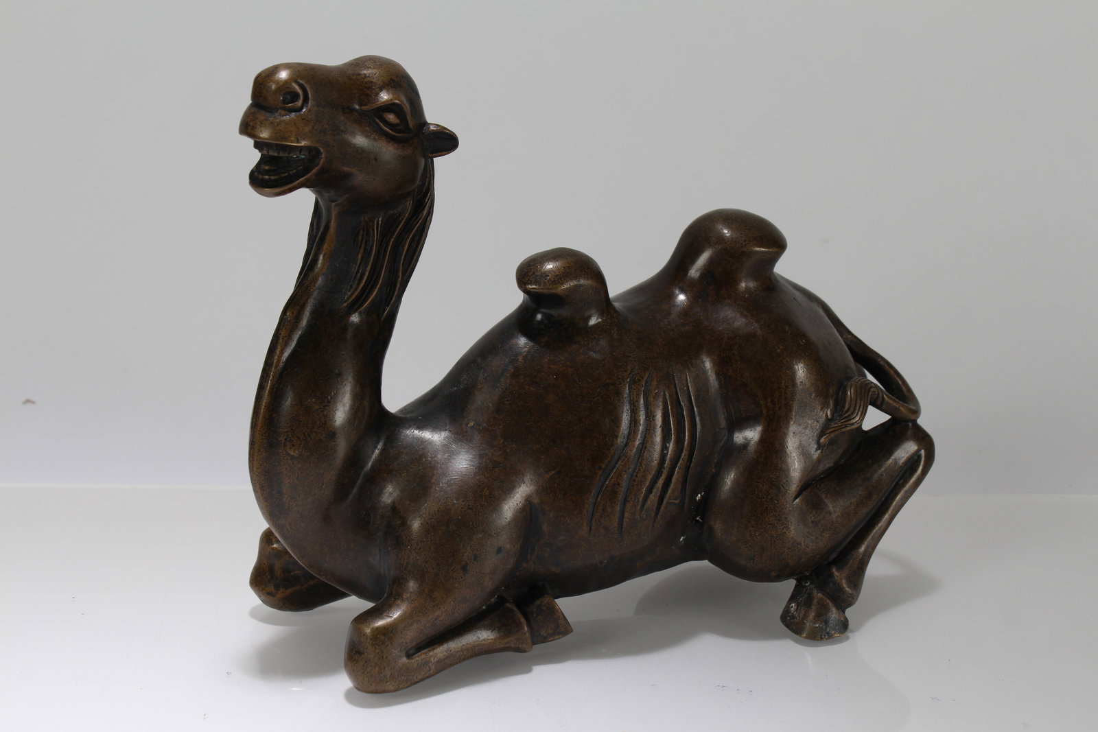 A Chinese Myth-beast Fortune Statue Display: A Chinese Myth-beast Fortune Statue Display. Height: 7 (inch). Length: 9 (inch). Width: 3 (inch).