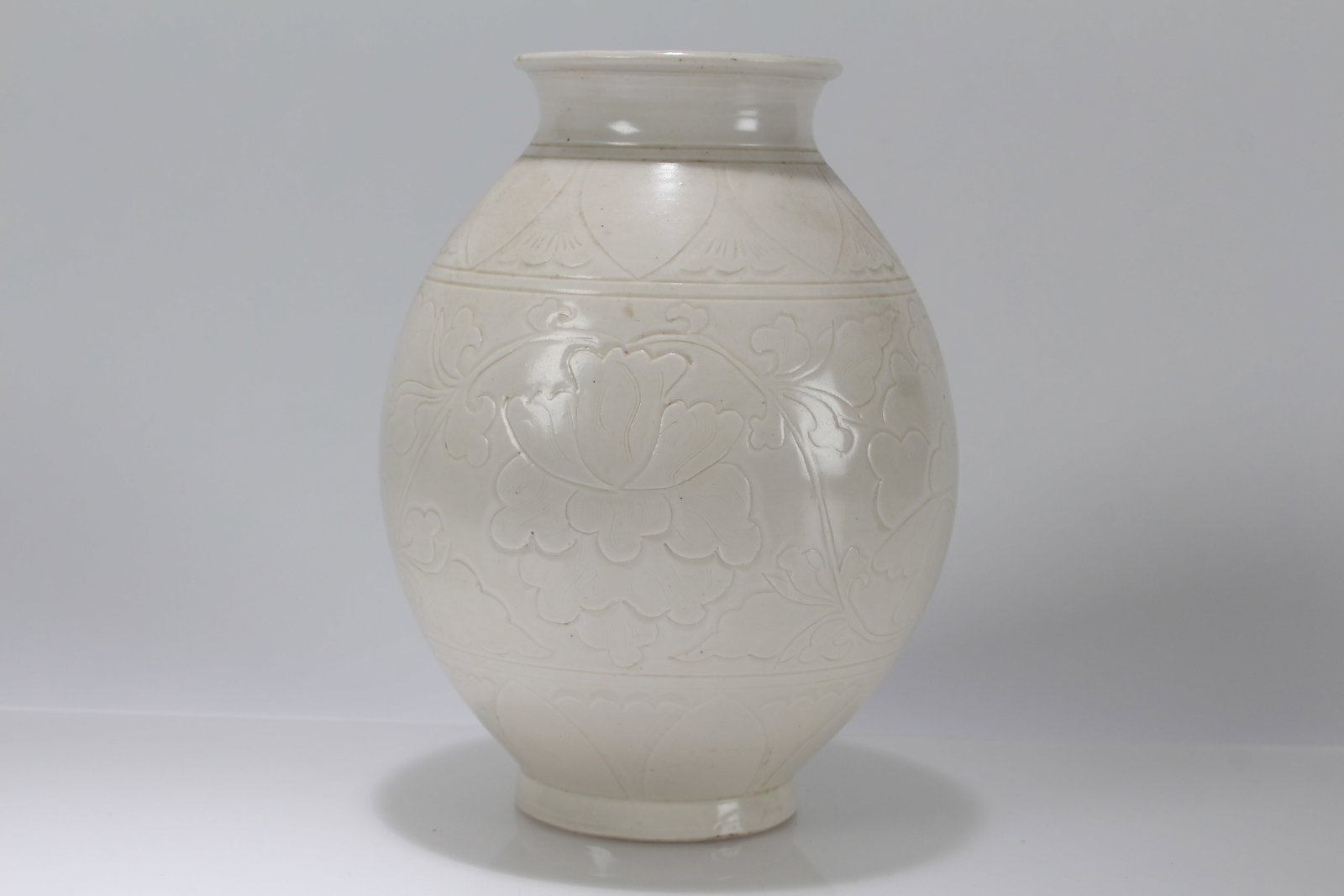 A Chinese Ancient-framing White Porcelain Fortune Vase: A Chinese Ancient-framing White Porcelain Fortune Vase . Height: 8 (inch).