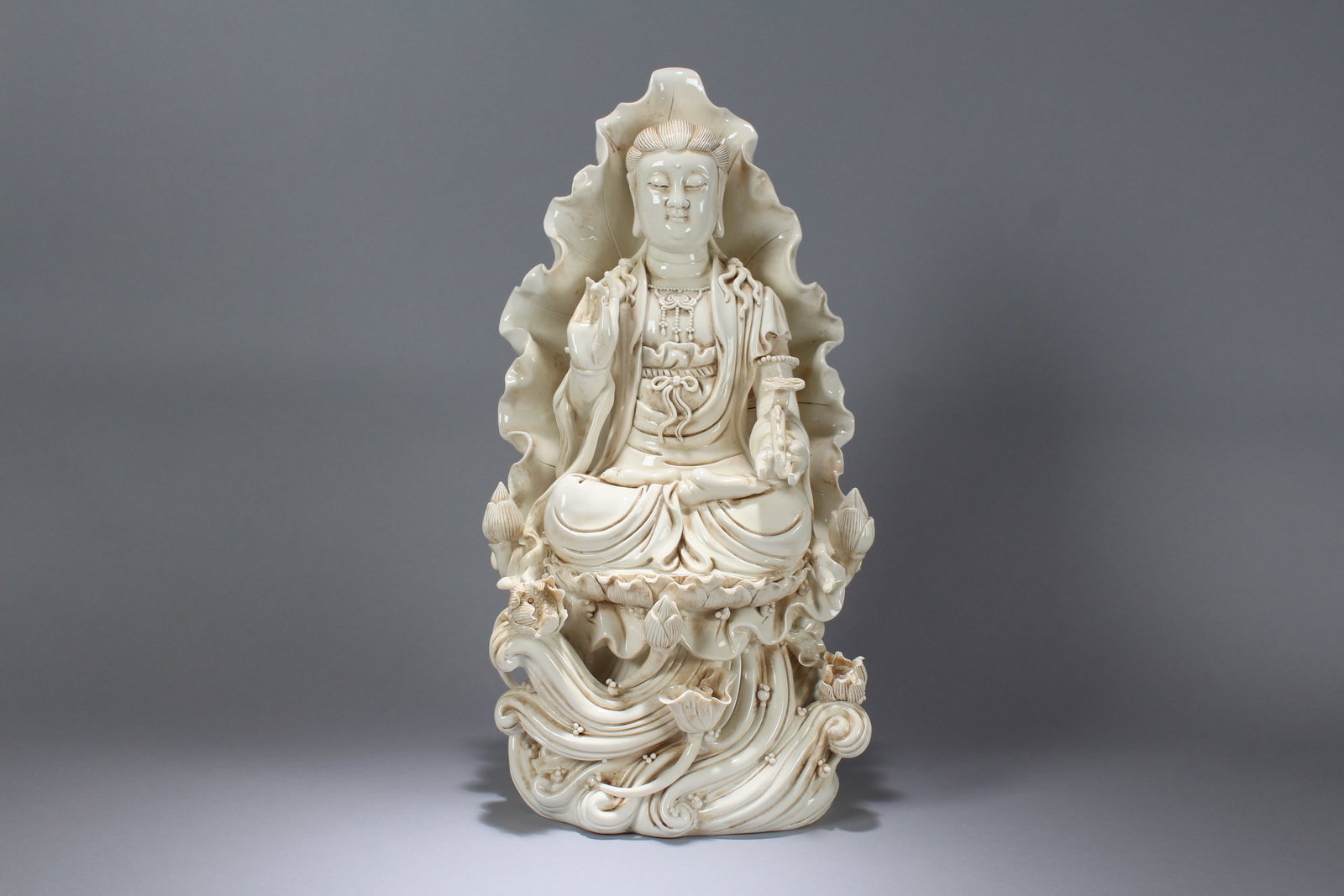 A Chinese Massive Vividly-detailed De Blac Religious Porcelain Statue: A Chinese Massive Vividly-detailed De Blac Religious Porcelain Statue. Height: 19.5 (inch). Length: 10 (inch). Width: 8 (inch).