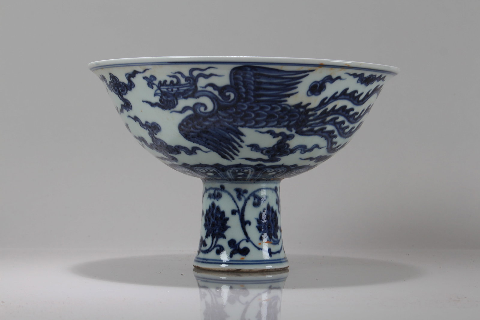 A Chinese Phoenix-fortune Blue and White Porcelain Cup: A Chinese Phoenix-fortune Blue and White Porcelain Cup. Height: 6.25 (inch). Opening Diameter: 9.75 (inch).