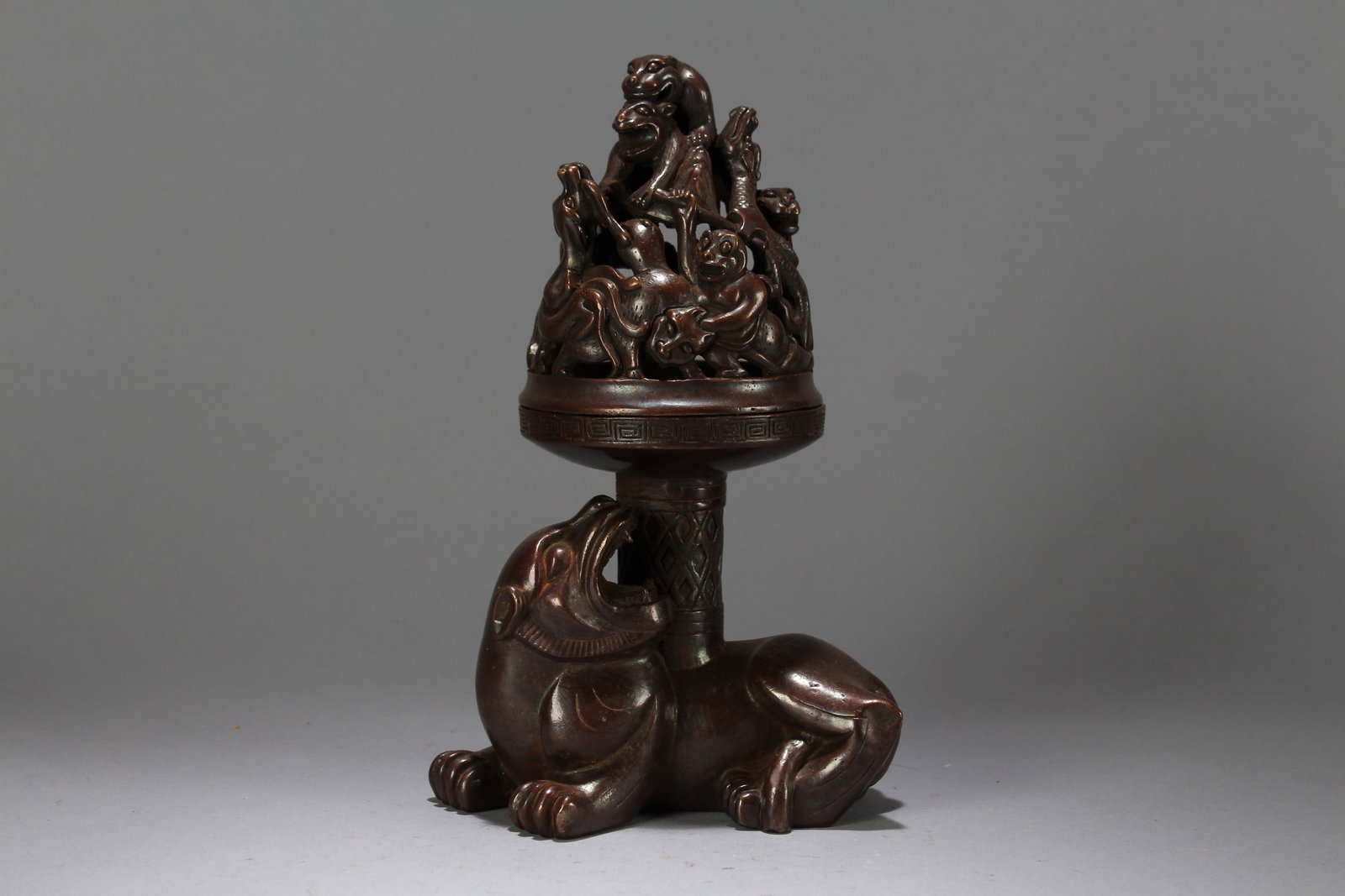A Chinese Vividly-detailed Lidded Myth-beast Fortune Censer: A Chinese Vividly-detailed Lidded Myth-beast Fortune Censer. Height: 9.75 (inch). Length: 5.75 (inch). Width: 4 (inch).