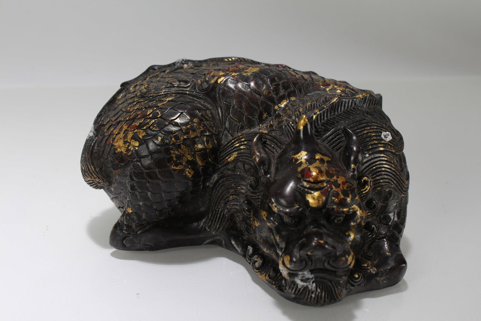 A Chinese Myth-beast Fortune Statue Display: A Chinese Myth-beast Fortune Statue Display. Height: 3 (inch). Length: 3.5 (inch). Width: 4 (inch).