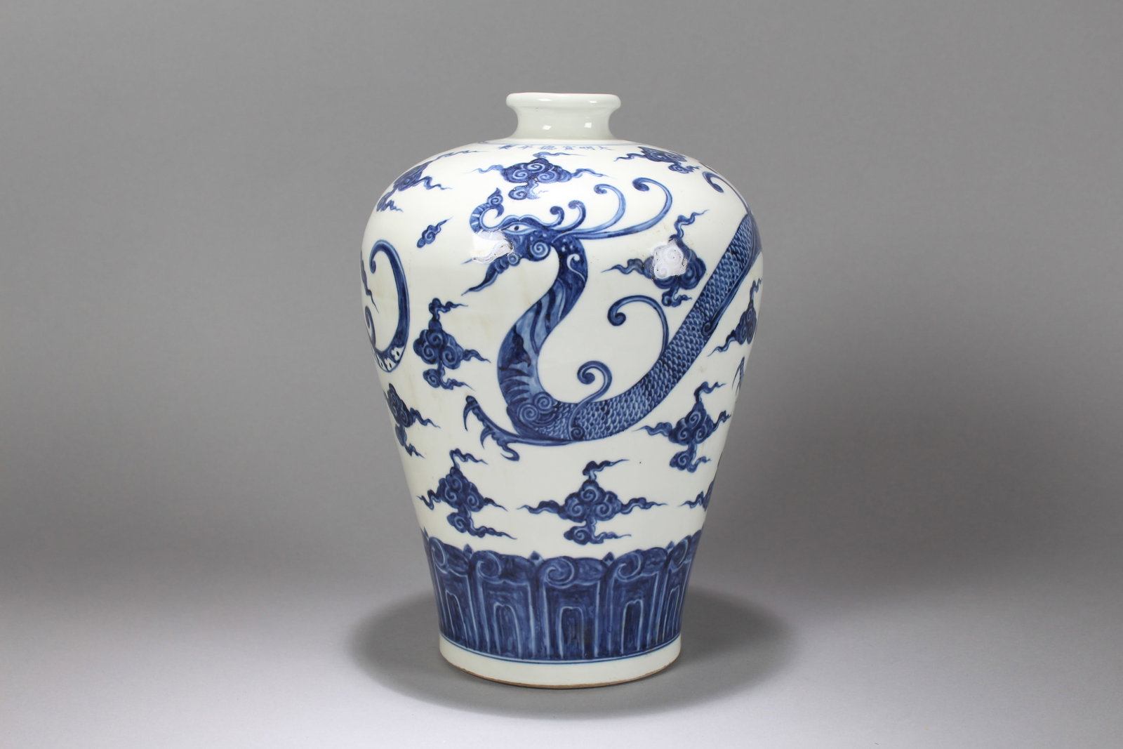 A Chinese Blue-and-white Dragon-decorating Porcelain Fortune Vase: A Chinese Blue-and-white Dragon-decorating Porcelain Fortune Vase. Height: 11.75 (inch). Opening Diameter: 8 (inch)