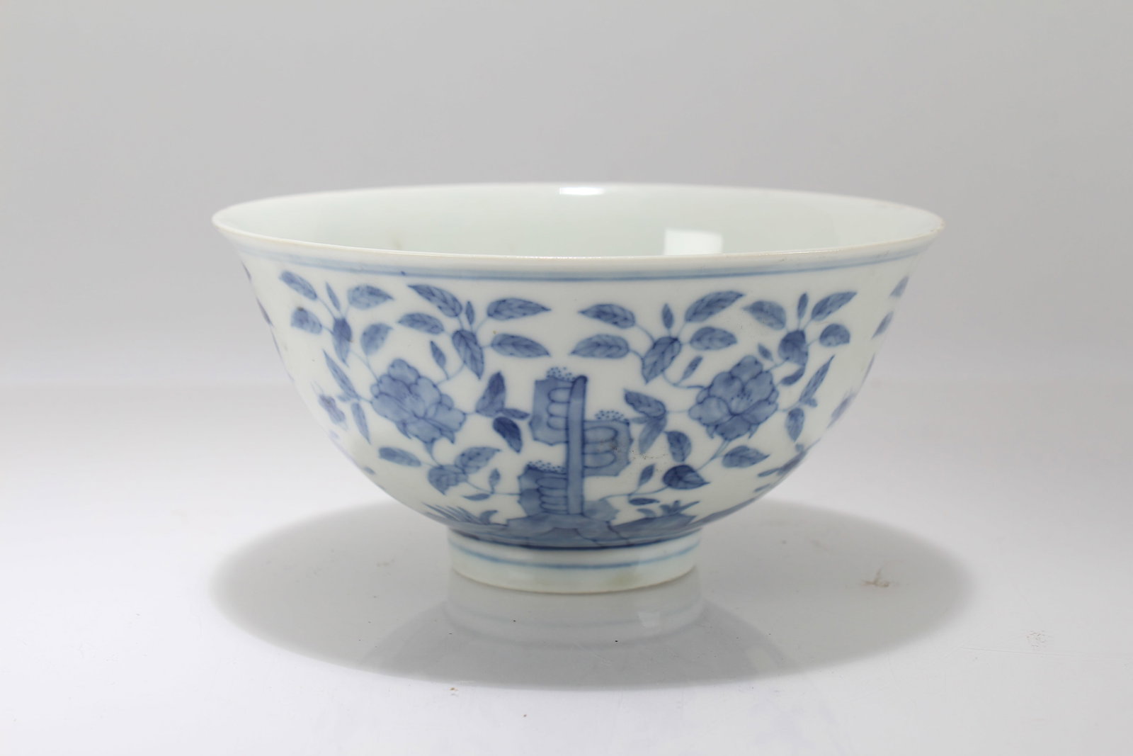 A Chinese Blue and White Porcelain Plant-fortune Cup: A Chinese Blue and White Porcelain Plant-fortune Cup. Height: 3 (inch). Width: 6 (inch).
