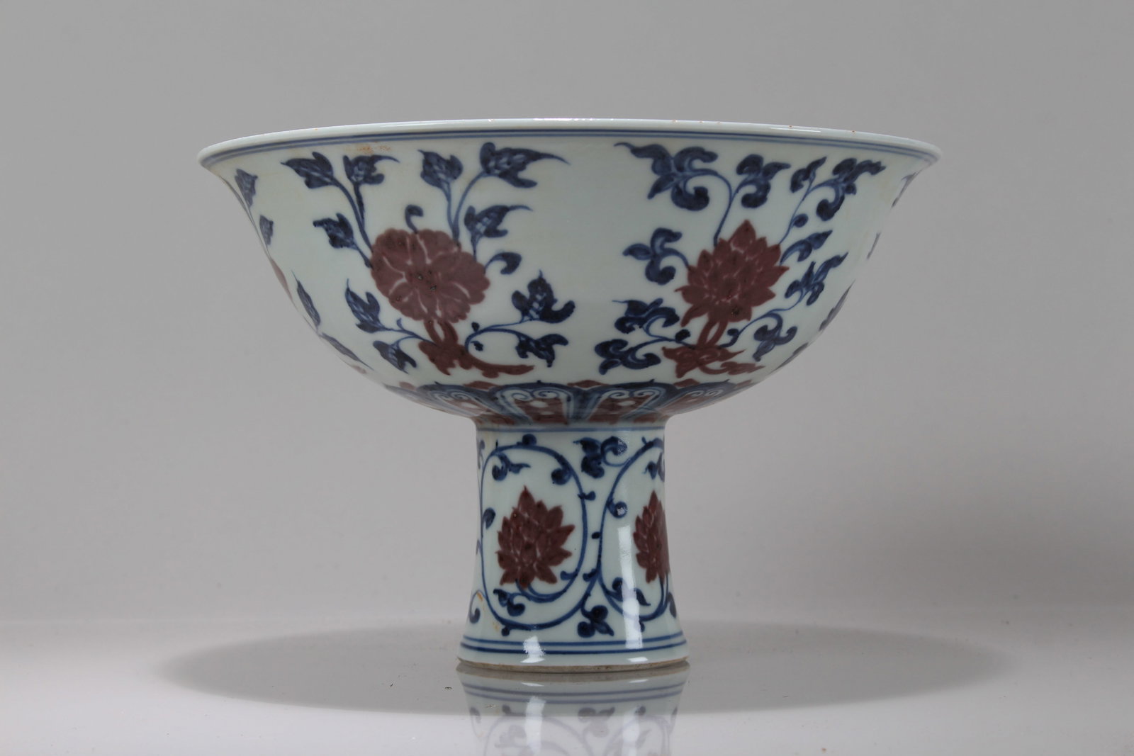 A Chinese Flower-blossom Blue and White Porcelain Cup: A Chinese Flower-blossom Blue and White Porcelain Cup. Height: 6.25 (inch). Opening Diameter: 9.75 (inch).
