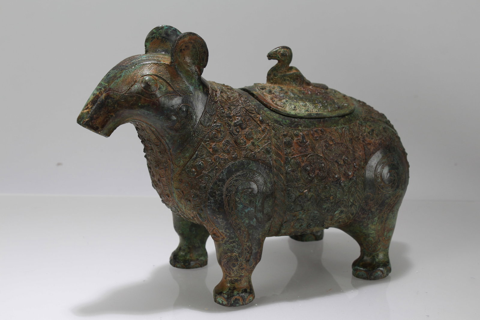 A Chinese Myth-beast Fortune Bronze Vessel Statue: A Chinese Myth-beast Fortune Bronze Vessel Statue. Height: 6.25 (inch). Length: 9.5 (inch). Width: 3.5 (inch).