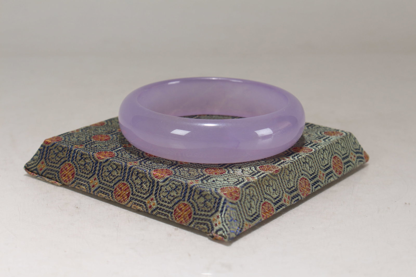 A Chinese Circular Fortune Bracelet: A Chinese Circular Fortune Bracelet. Opening Diameter: 3 (inch).