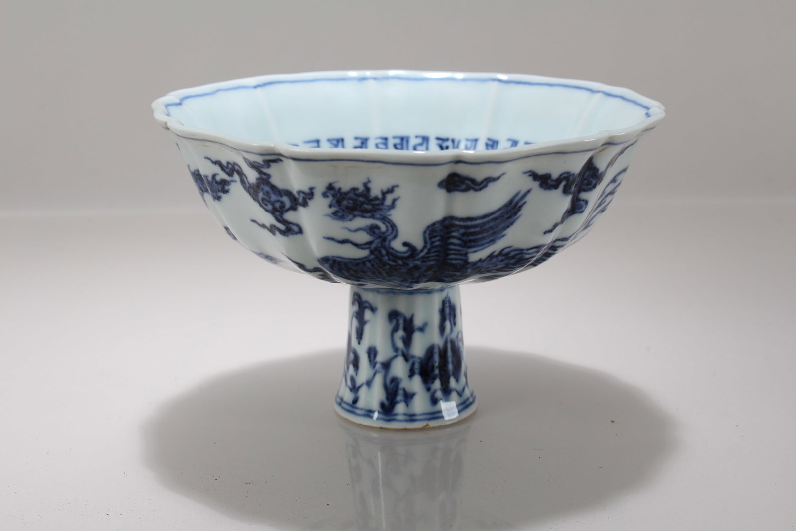 A Chinese Phoenix-fortune Blue and White Porcelain Cup: A Chinese Phoenix-fortune Blue and White Porcelain Cup. Height: 4 (inch). Opening Diameter: 6 (inch).