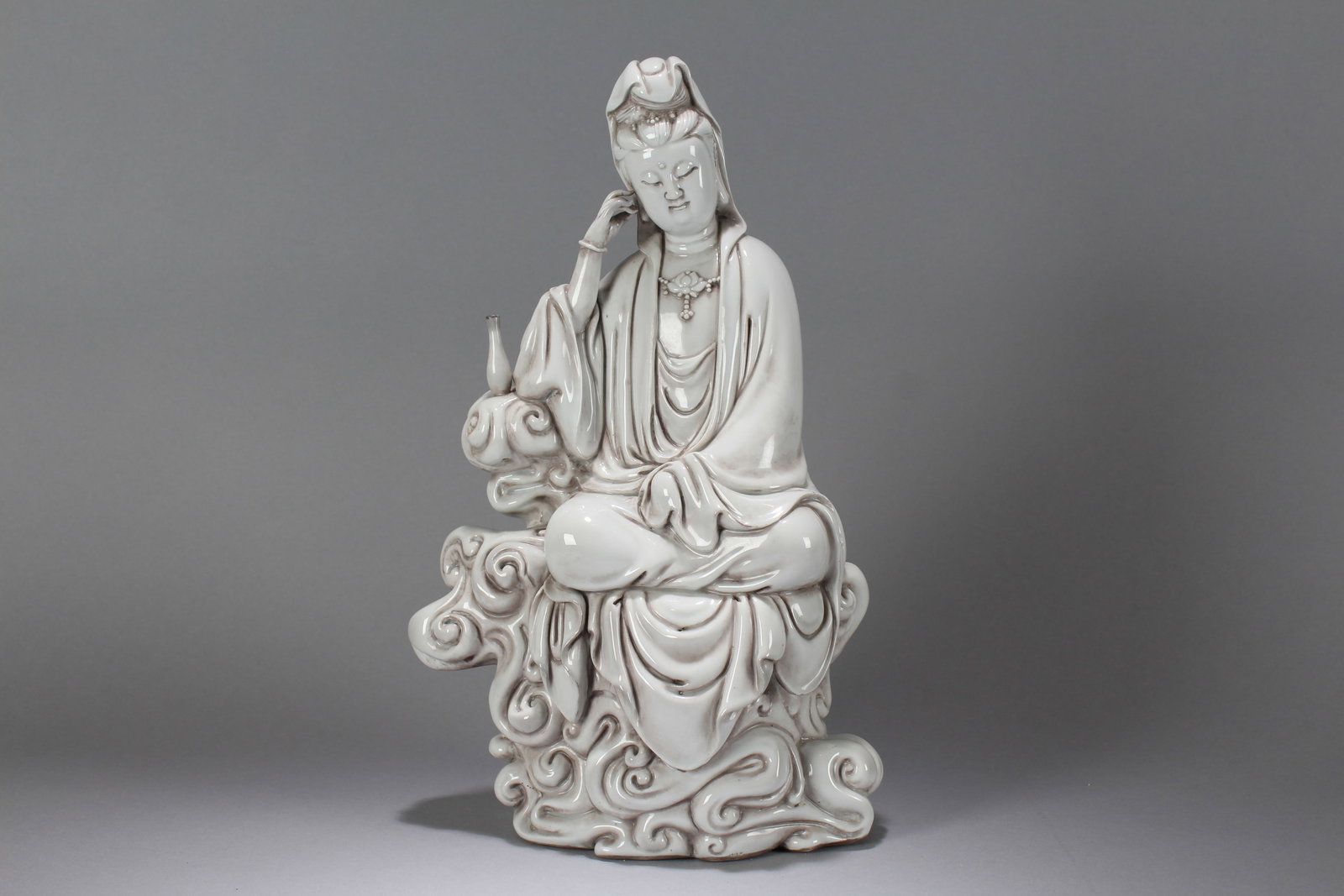 A Chinese Massive Vividly-detailed De Blac Porcelain Fortune Buddha Statue: A Chinese Massive Vividly-detailed De Blac Porcelain Fortune Buddha Statue. Height: 14.5 (inch). Width: 8 (inch). Length: 4 (inch).