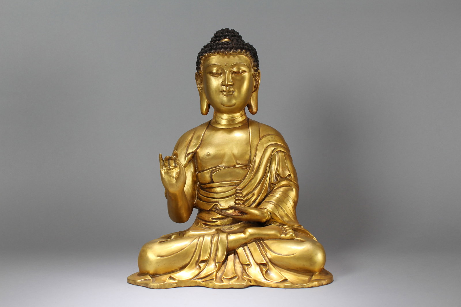 A Chinese Pondering-pose Gilt Fortune Buddha Statue: A Chinese Pondering-pose Gilt Fortune Buddha Statue. Height: 15.75 (inch). Width: 12.5 (inch). Length: 9 (inch)