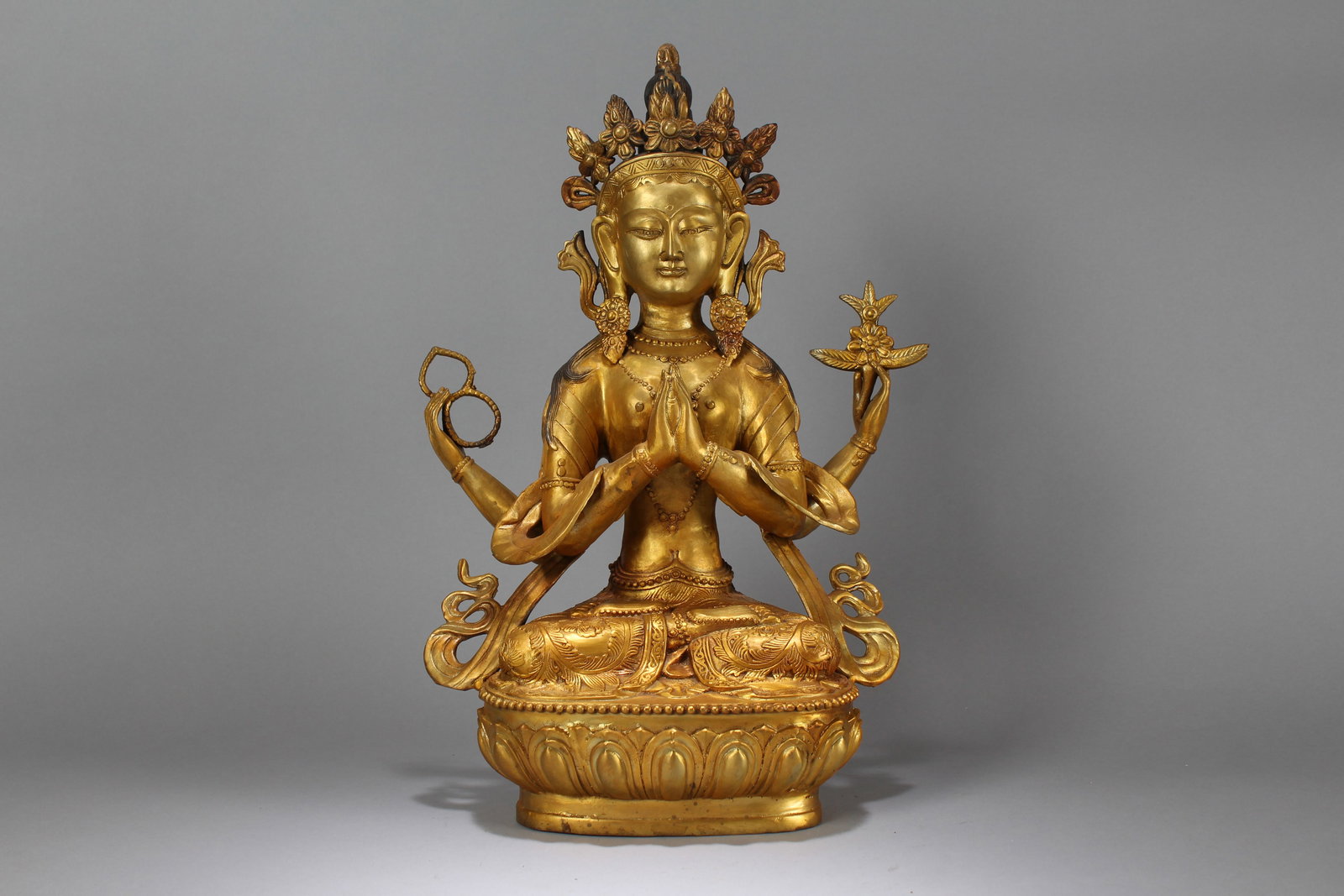 A Chinese Lotus-seated Gilt Fortune Buddha Statue: A Chinese Pondering-pose Gilt Fortune Buddha Statue. Height: 19 (inch). Width: 13 (inch). Length: 7 (inch)