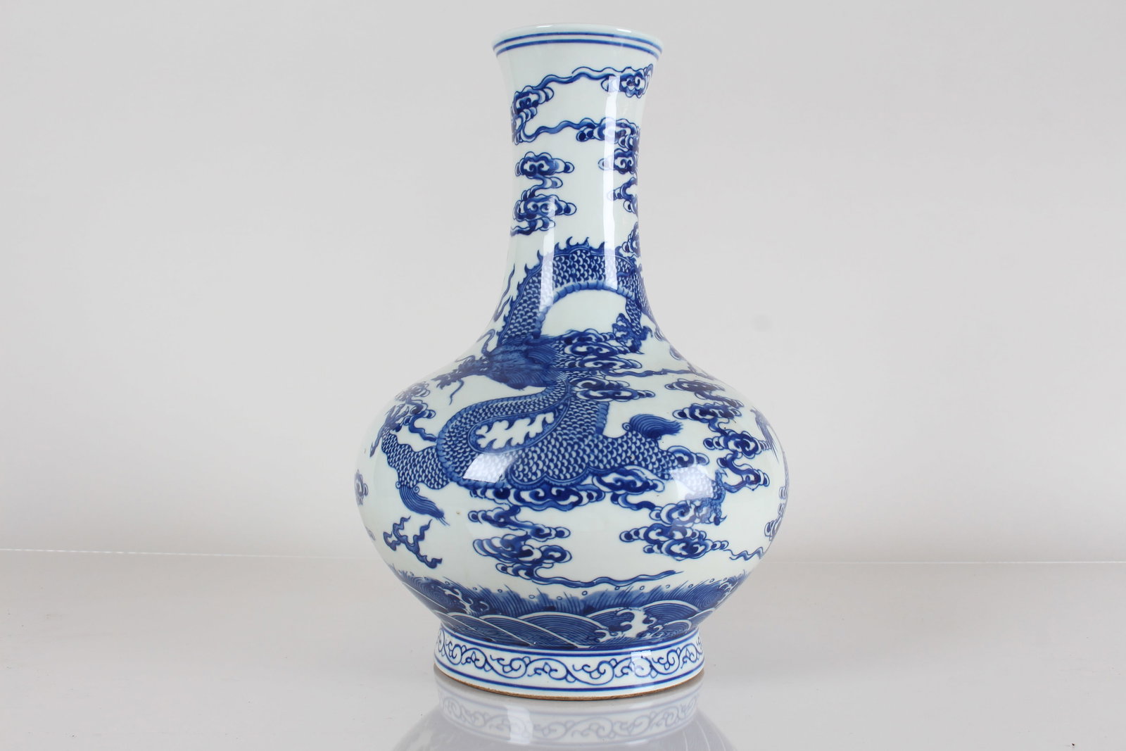 A Chinese Dragon-decorating Blue and White Porcelain Fortune Vase: A Chinese Dragon-decorating Blue and White Porcelain Fortune Vase . Height: 13 (inch).