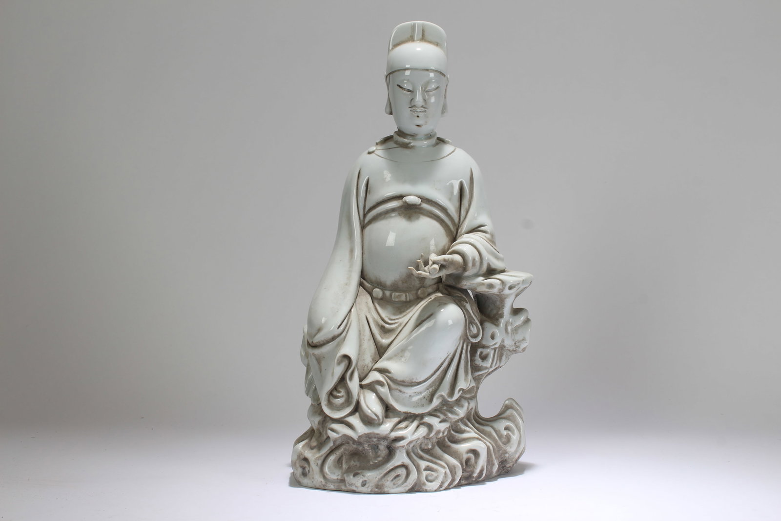 A Chinese White Porcelain Buddha Statue: A Chinese White Porcelain Buddha Statue . Height: 13.5 (inch).