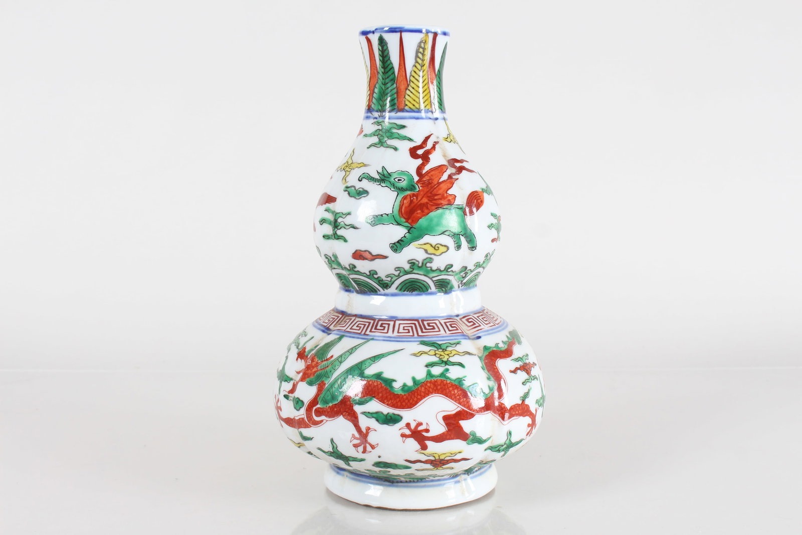 A Chinese Dragon-decorating Porcelain Fortune Vase: A Chinese Dragon-decorating Porcelain Fortune Vase . Height: 9.25 (inch).