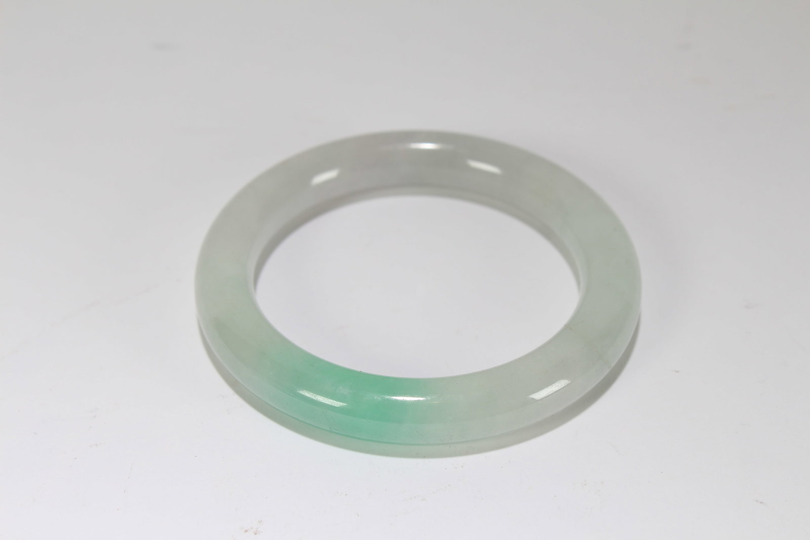 A Chinese Fortune Bangle: A Chinese Fortune Bangle. Opening Diameter: 3 (inch).