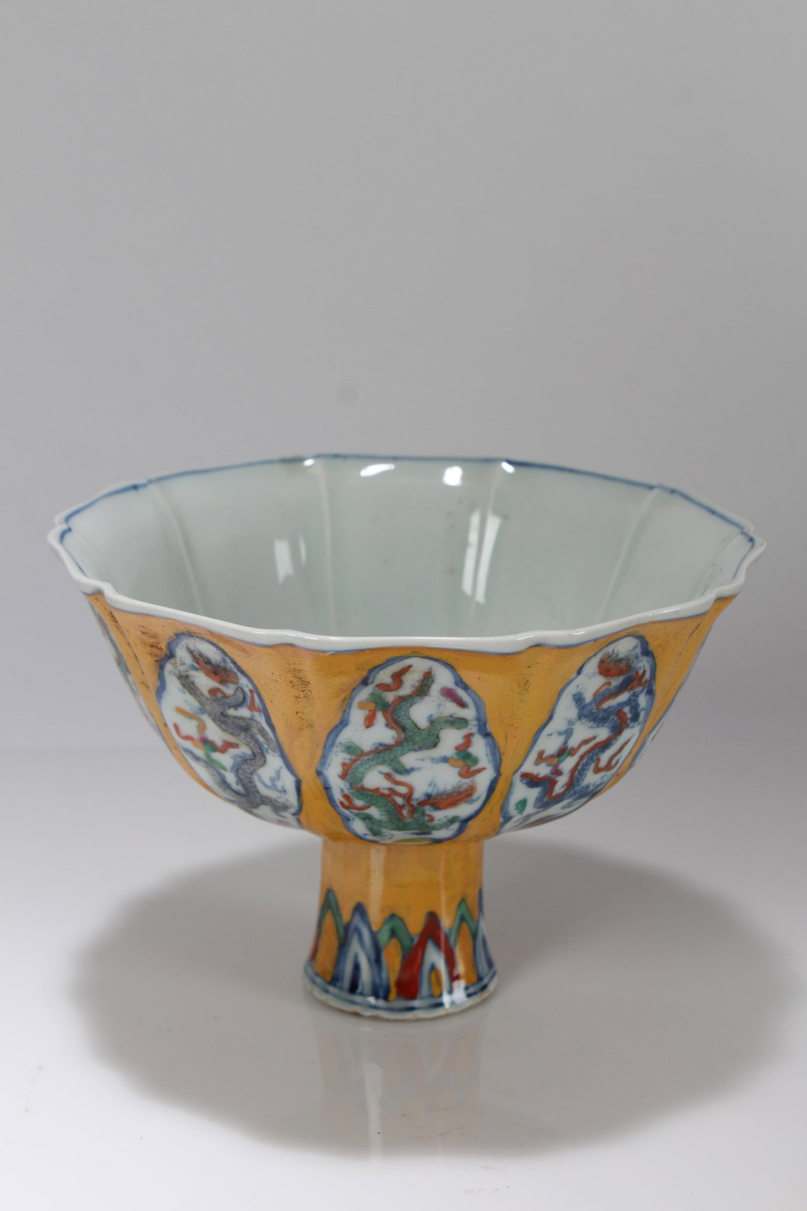 A Chinese Dragon-decorating Porcelain Fortune Tall-end Cup: A Chinese Dragon-decorating Porcelain Fortune Tall-end Cup. Height: 4.5 (inch). Opening Diameter: 6.5 (inch).