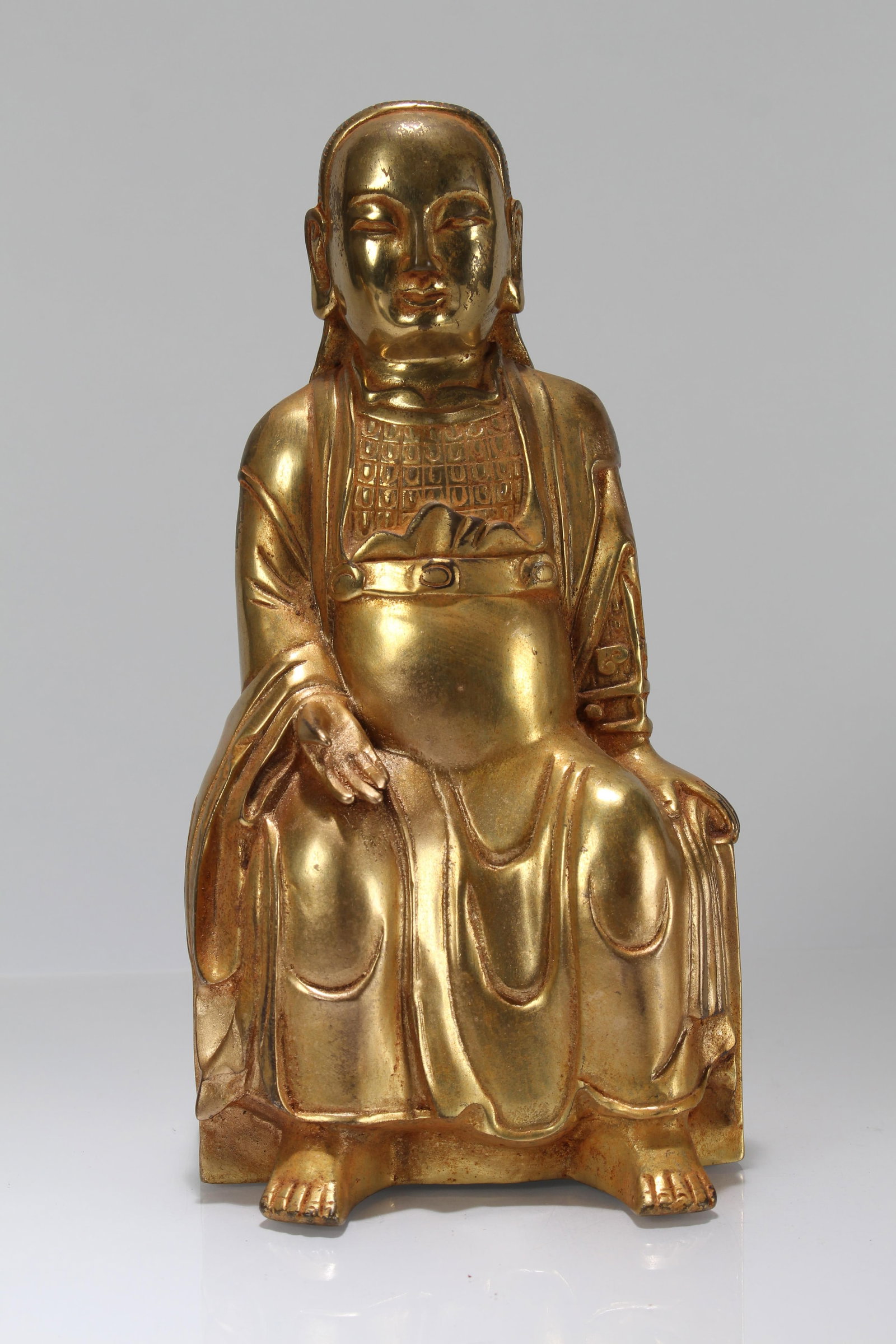 A Chinese Gilt Religious Fortune Buddha Statue (1 of 4)