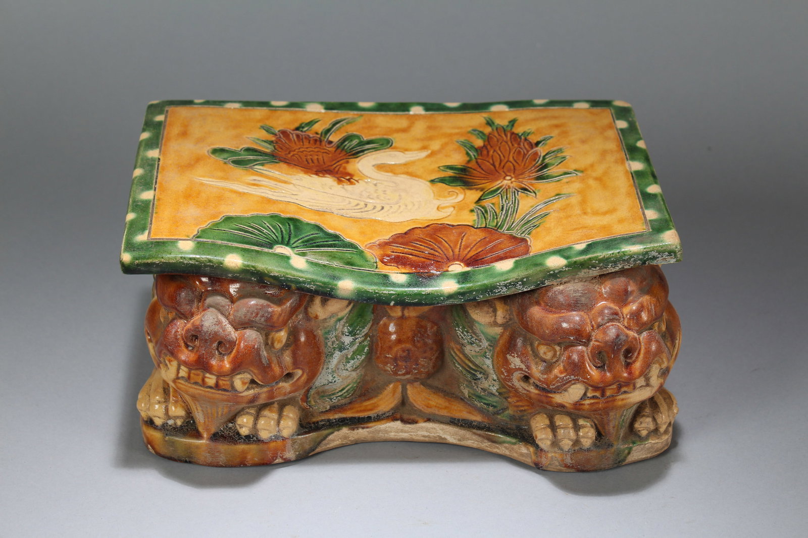 A Chinese Religious Porcelain Fortune Pillow Stand: A Chinese Religious Porcelain Fortune Pillow Stand. Height: 5 (inch). Width: 10 (inch). Length: 6.25 (inch)