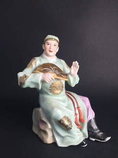 A Chinese Porcelain Made Man Statue: A Chinese Porcelain Made Man Statue. Height: 8.0 inch. Width: 4.0 inch.