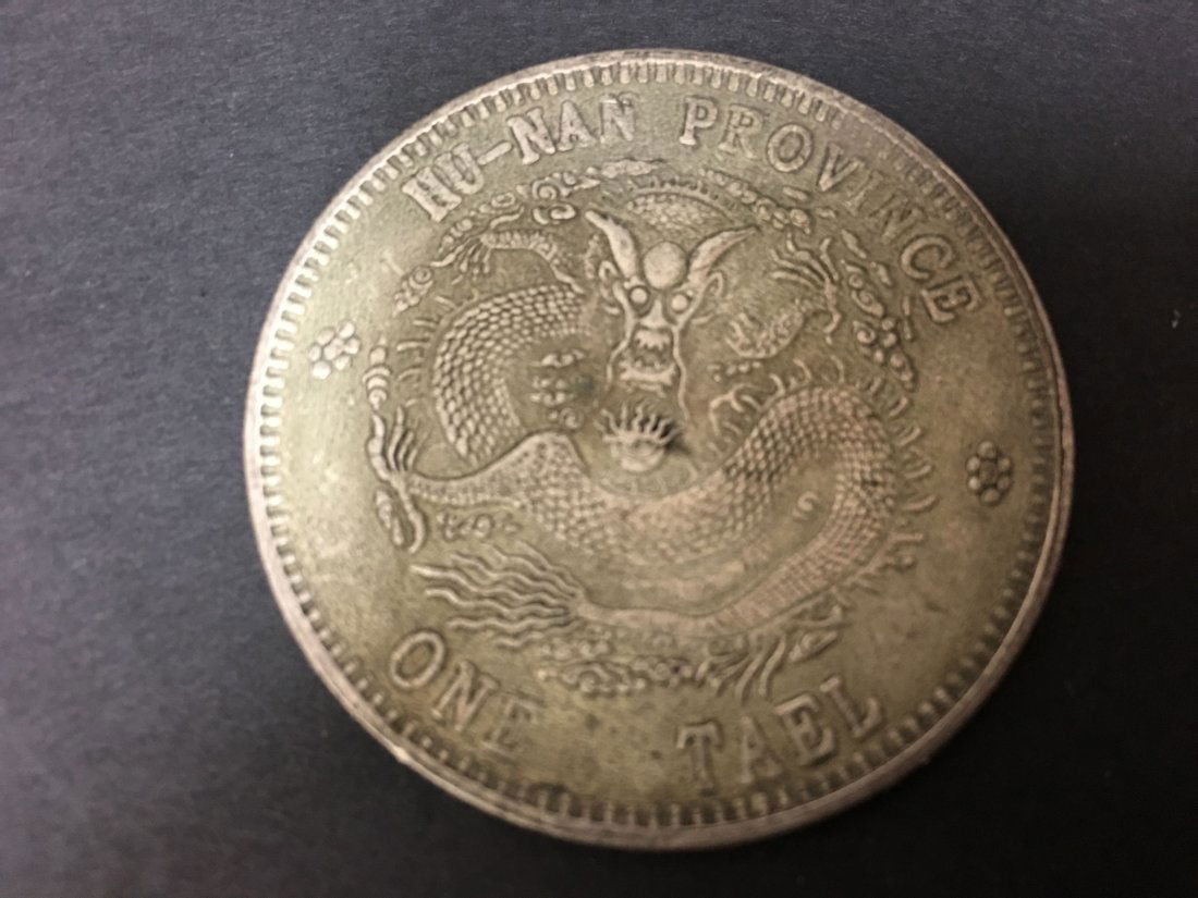 A Chinese Dragon Silver Coin (1 of 2)