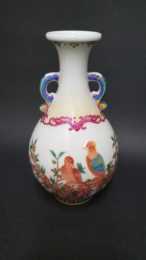 A Chinese Fortune Windows Handled Birds Porcelain Vase: A Chinese Fortune Windows Handled Birds Porcelain Vase. Height: 6.75 inch. Top Diameter: 1.5 inch. Bottom Diameter: 1.75 inch