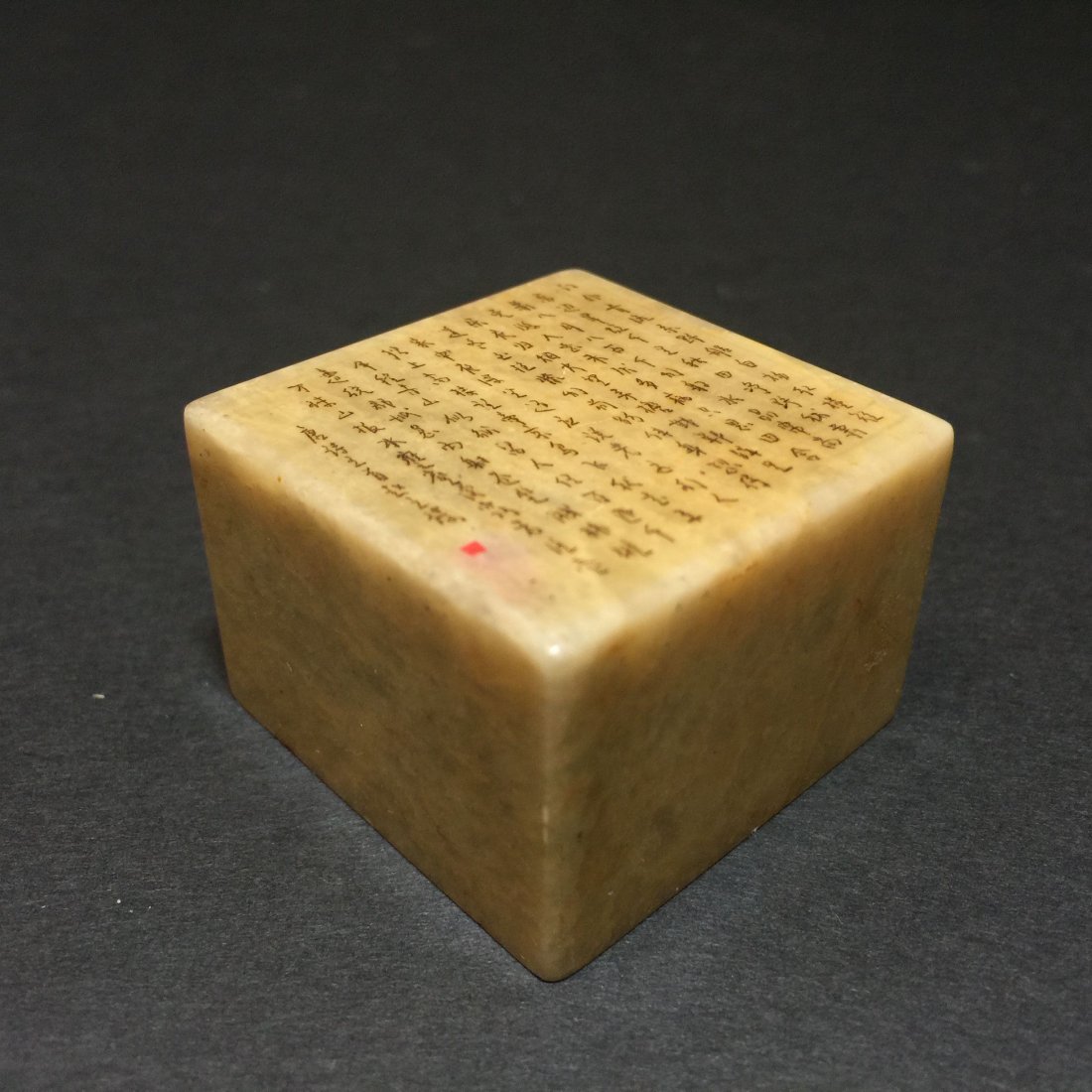 A Soapstone Used Curving Stamp: A Soapstone Used Curving Stamp. Dimension: 1.9 x 1.9 (inch).. Height: 1.0 (inch).