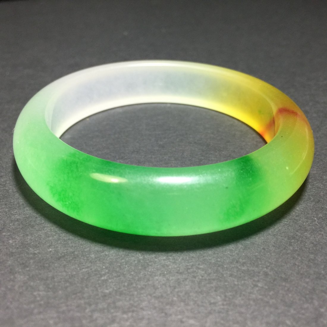 A Tri-color Jadestone Bangle (1 of 4)