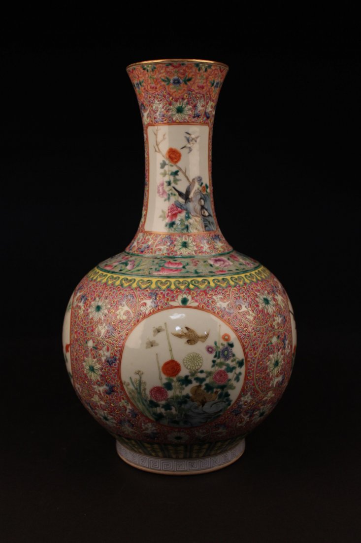 A Chinese Famille Rose Tri-fortune Windowed Vase: A Chinese Famille Rose Tri-fortune Windowed Vase. Height: 15.5 (inch).